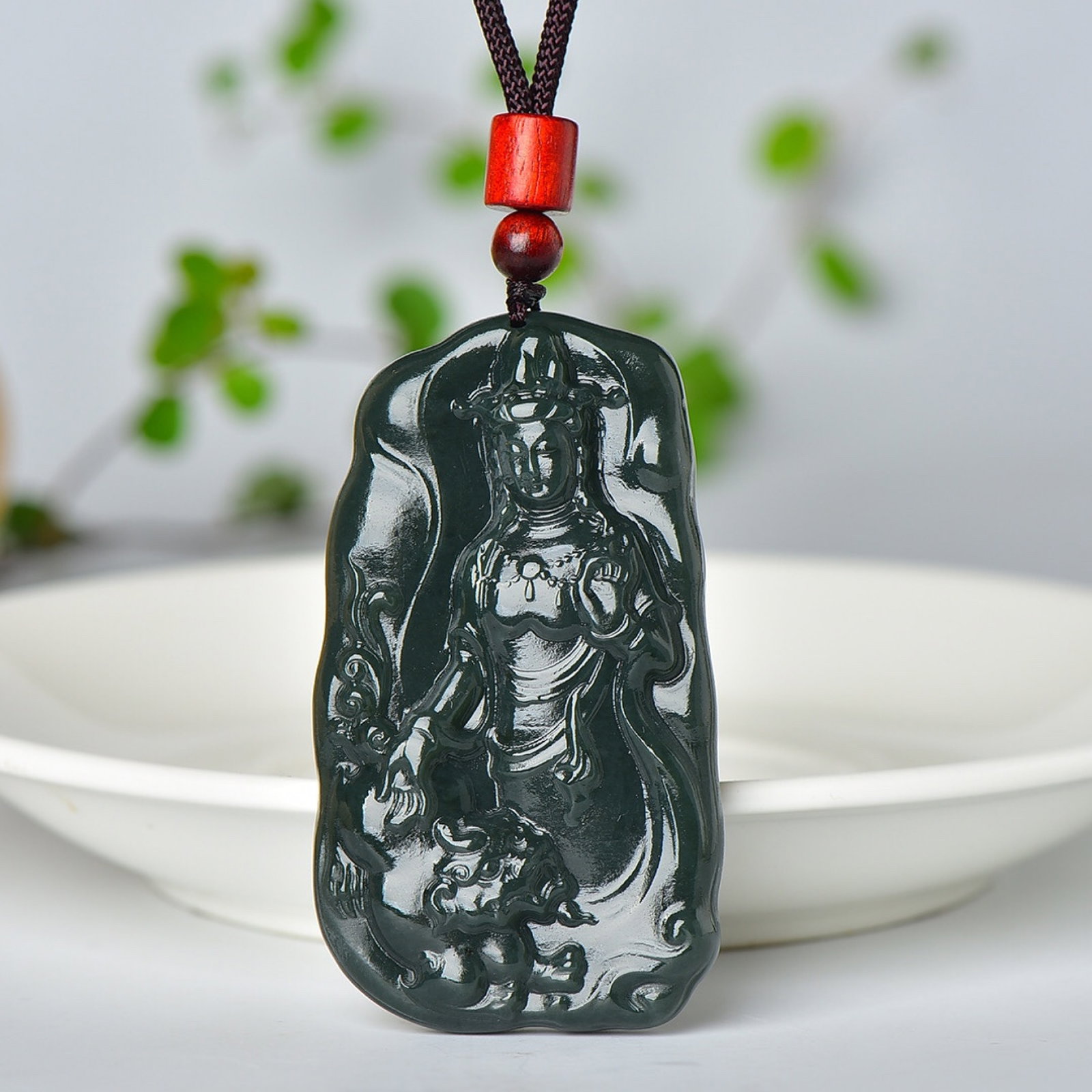 An Exquisite Sapphire Avalokitesvara Pattern Pendant: An Exquisite Sapphire Avalokitesvara Pattern Pendant,Size:40mmx46mm (寓意)寓意吉祥 玉脂温润
