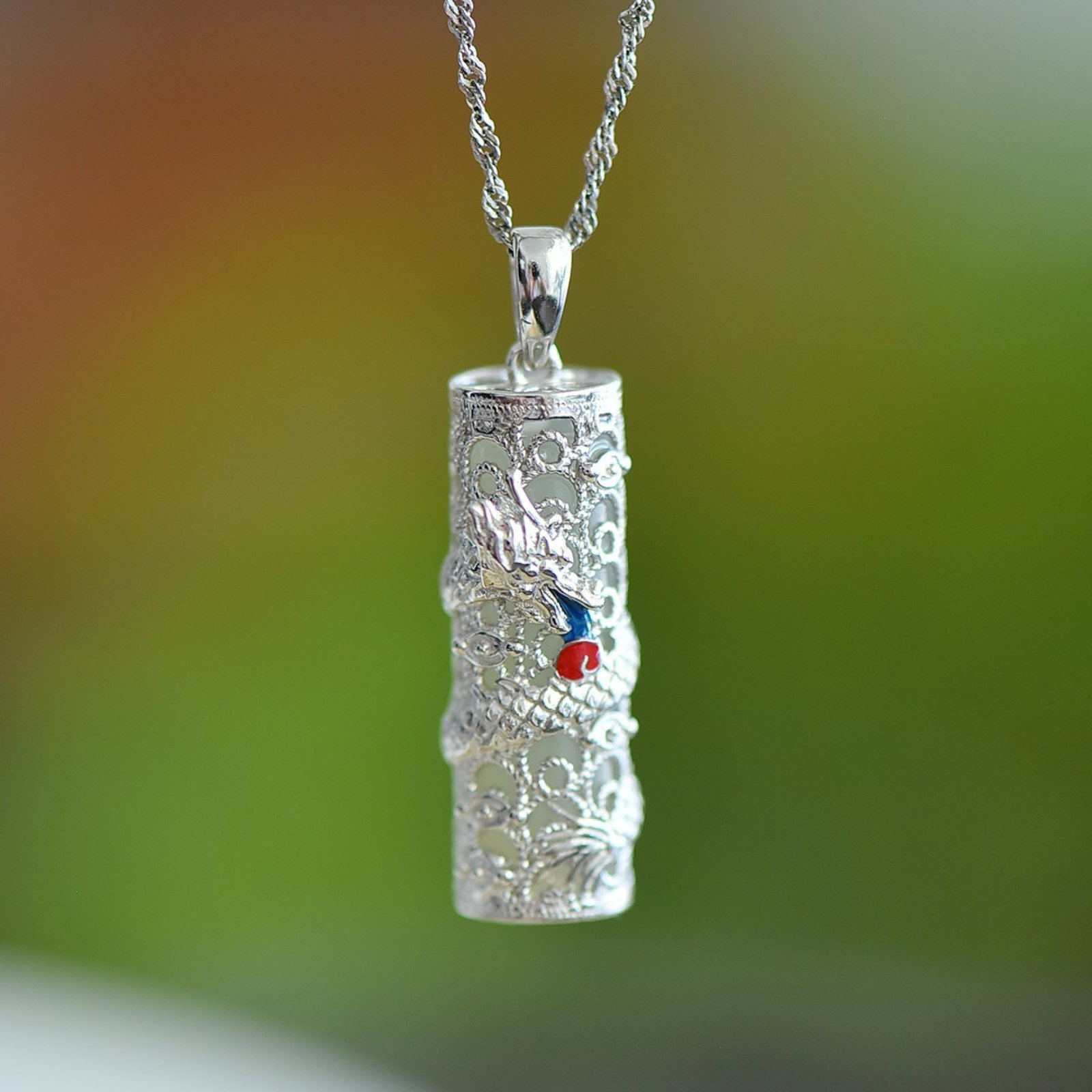 An Exquisite Sterling Silver Inlaid White Jade Pendant: An Exquisite Sterling Silver Inlaid White Jade Pendant,Size:7mmx23mm 纯银镶白玉吊坠