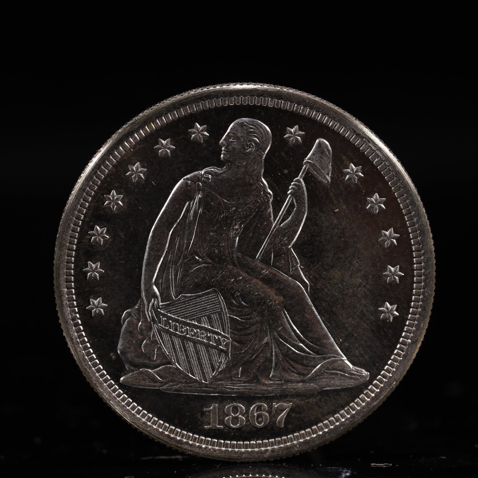 USA One Dollar 1867 Coin: American coin. IN GOD WE TRUST / LIBERTY / 1867 / UNITED STATES OF AMERICA / ONE DOL. Weight:26.9g.