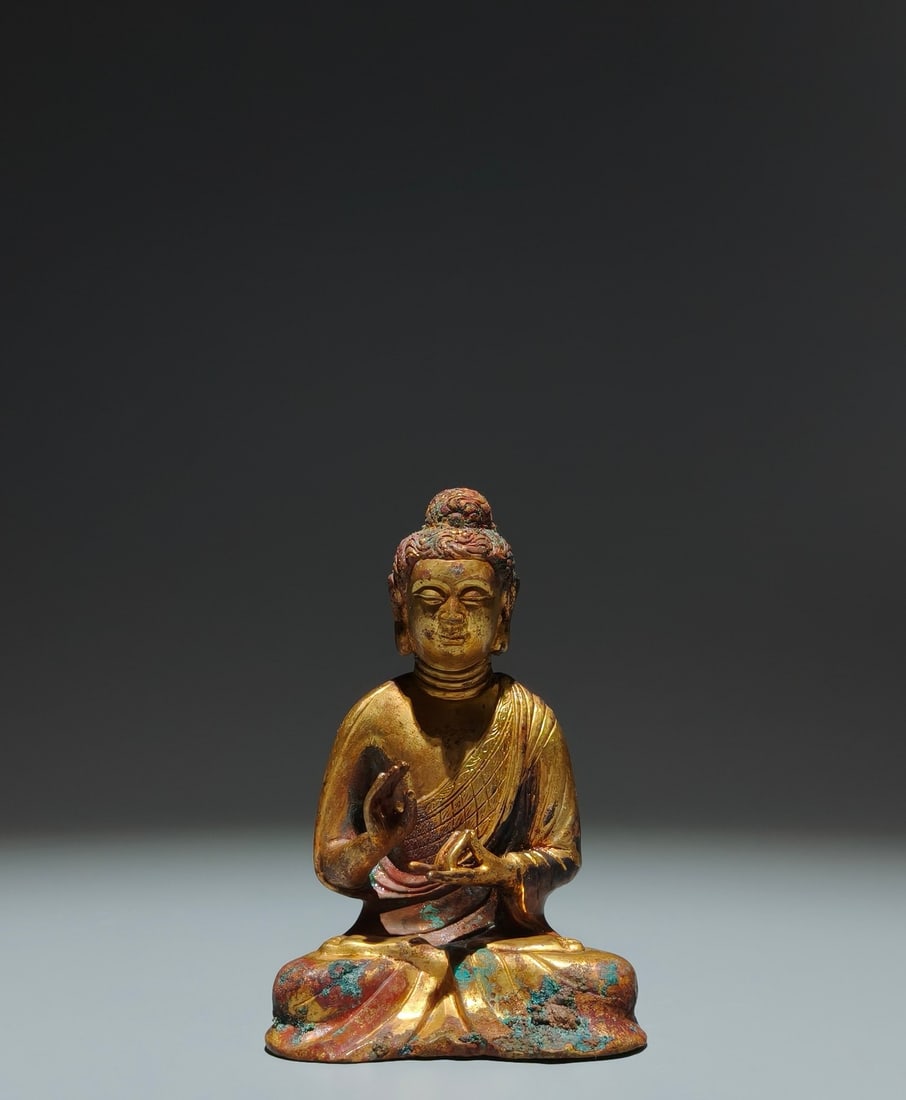 A Solemn Gilt Bronze Statue of Sakyamuni: A Solemn Gilt Bronze Statue of Sakyamuni,Tang Dynasty,China,Size:4.9inx3.3inx2.2in 铜鎏金释迦摩尼像,中国唐代
