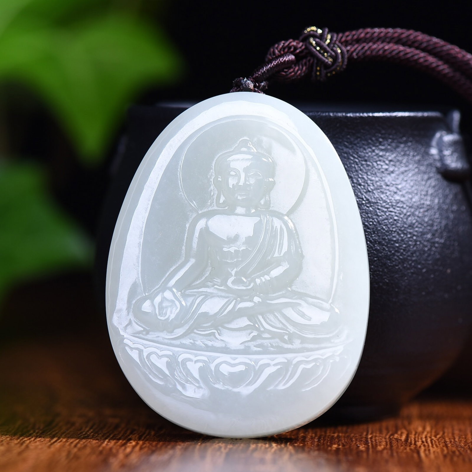 An Exquisite White Jade Sakyamuni Pattern Pendant: An Exquisite White Jade Sakyamuni Pattern Pendant,Size:40mmx52mm (寓意)吉祥释迦牟尼 做工精细,寓意吉祥,&#