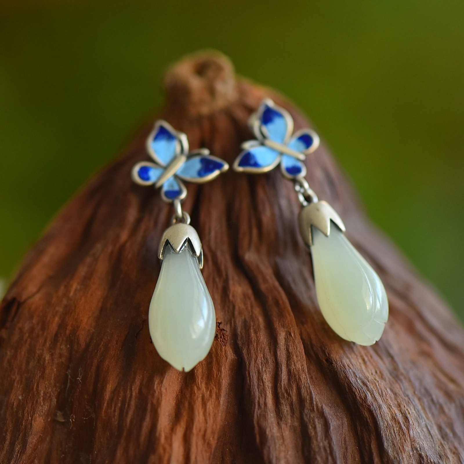 A Pair of Exquisite Sterling Silver Inlaid White Jade Earrings: A Pair of Exquisite Sterling Silver Inlaid White Jade Earrings 一对纯银镶白玉耳环