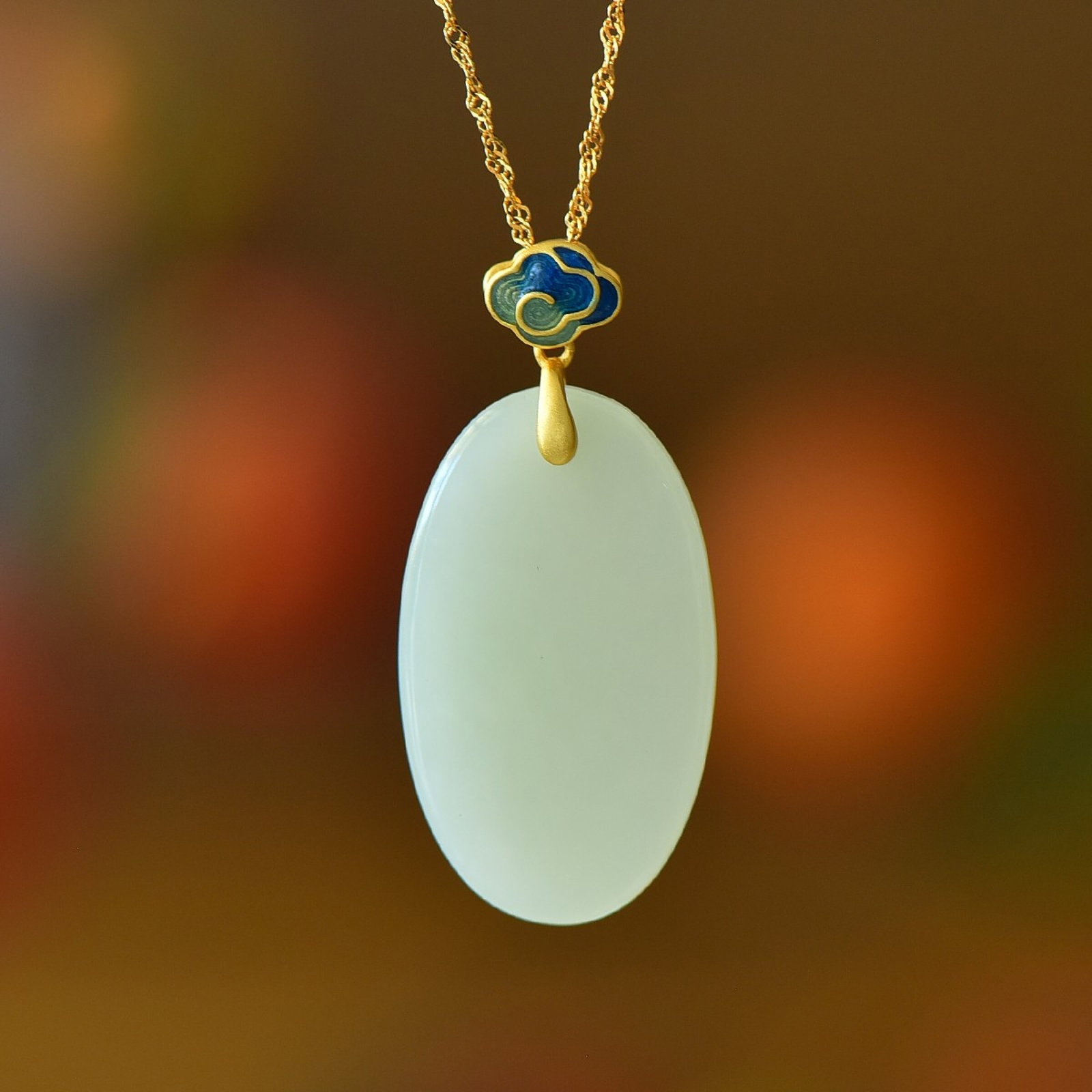 An Exquisite Sterling Silver-Gold Plated Inlaid White Jade Pendant: An Exquisite Sterling Silver-Gold Plated Inlaid White Jade Pendant,Size:19mmx32mm 纯银镀金镶白玉吊坠