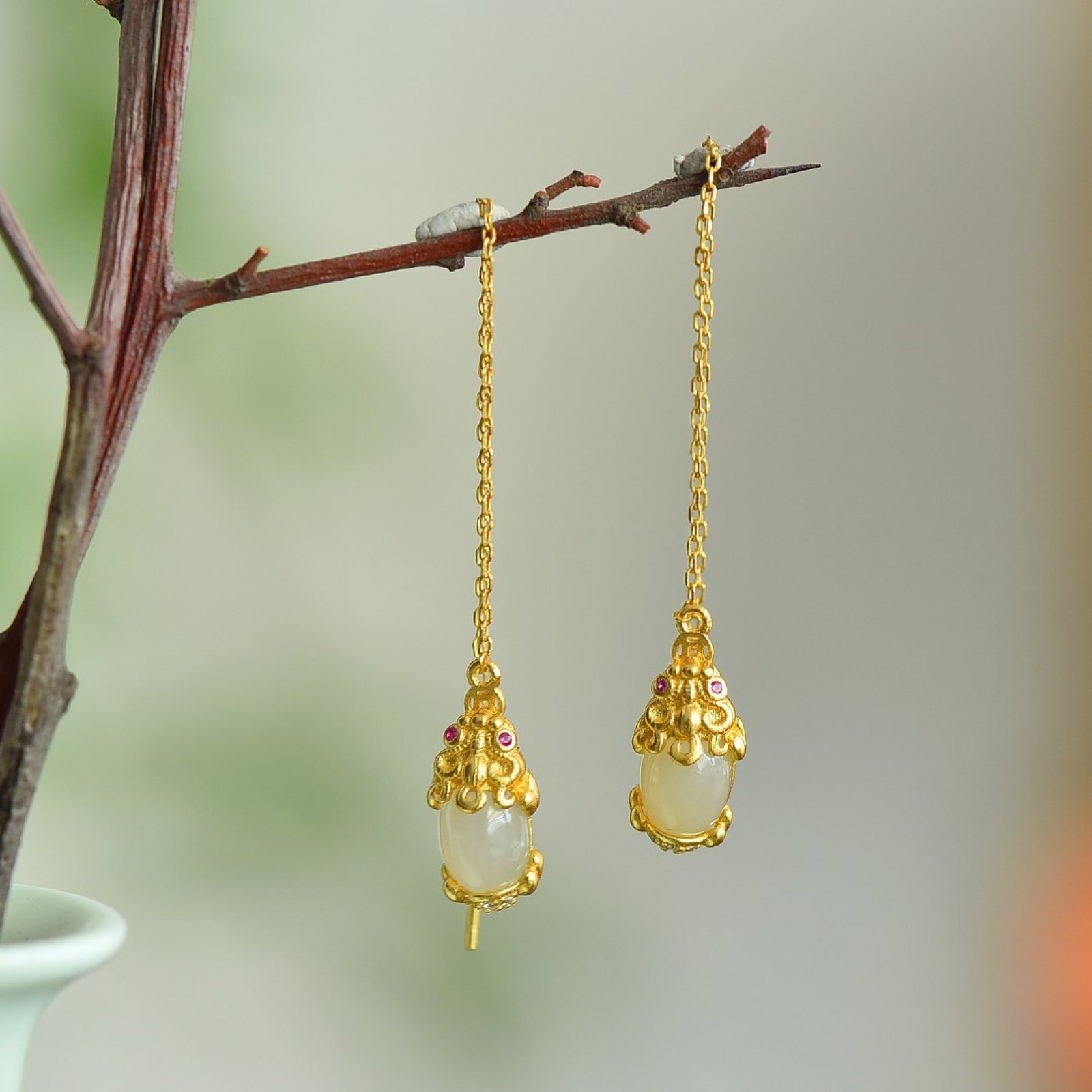 A Pair of Exquisite Sterling Silver-Gold Plated Inlaid White Jade Earrings: A Pair of Exquisite Sterling Silver-Gold Plated Inlaid White Jade Earrings,Size:8mmx6mm 一对纯银镀金镶白玉耳环