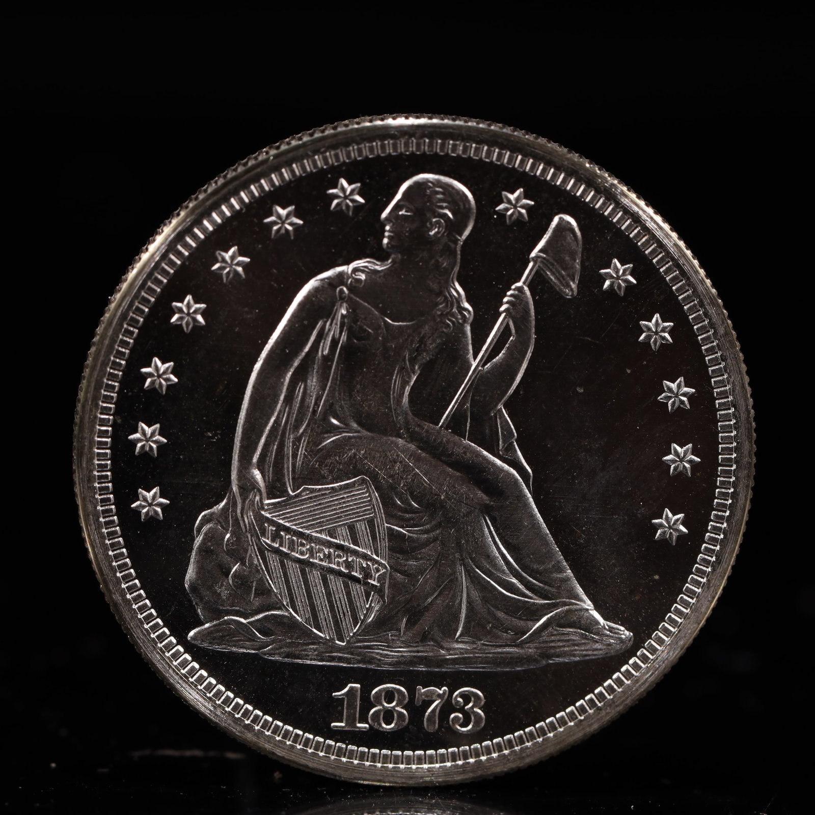 USA One Dollar 1873 Coin: American coin. IN GOD WE TRUST / LIBERTY / 1873 / UNITED STATES OF AMERICA / ONE DOL. Mint Mark: CC.Weight:26.9g.