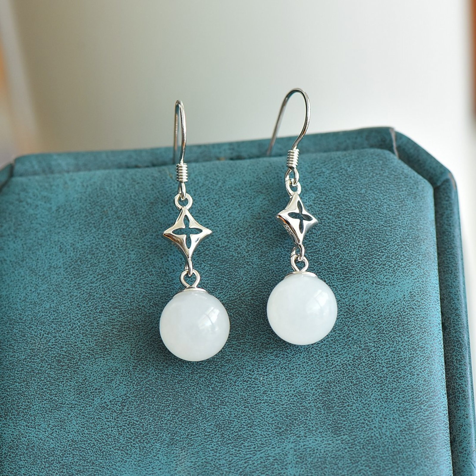 A Pair of Exquisite Sterling Silver Inlaid White Jade Earrings: A Pair of Exquisite Sterling Silver Inlaid White Jade Earrings,Size:10mmx10mm 一对纯银镶白玉耳环
