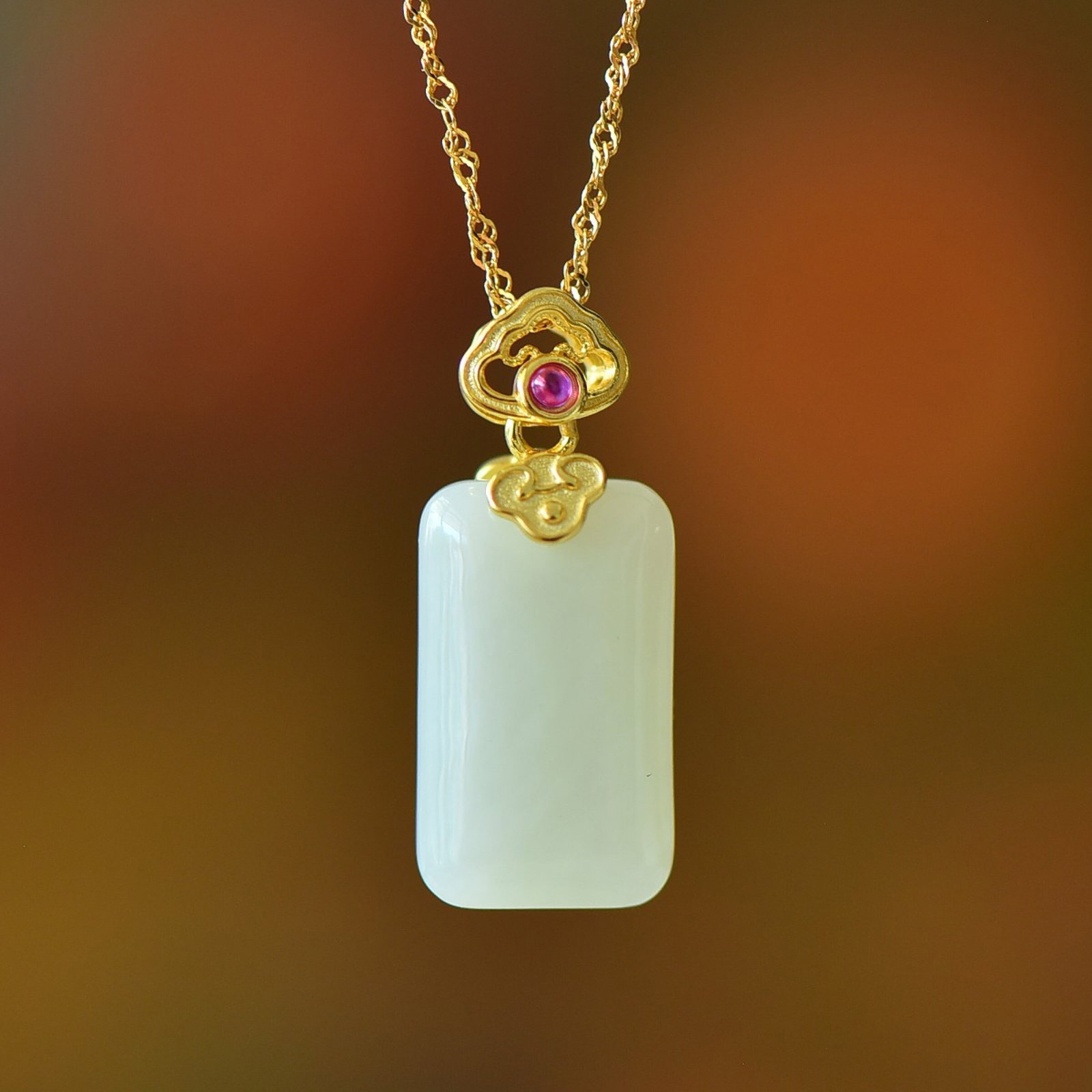 An Exquisite Sterling Silver-Gold Plated Inlaid White Jade Pendant: An Exquisite Sterling Silver-Gold Plated Inlaid White Jade Pendant,Size:18mmx24mm 纯银镀金镶白玉吊坠