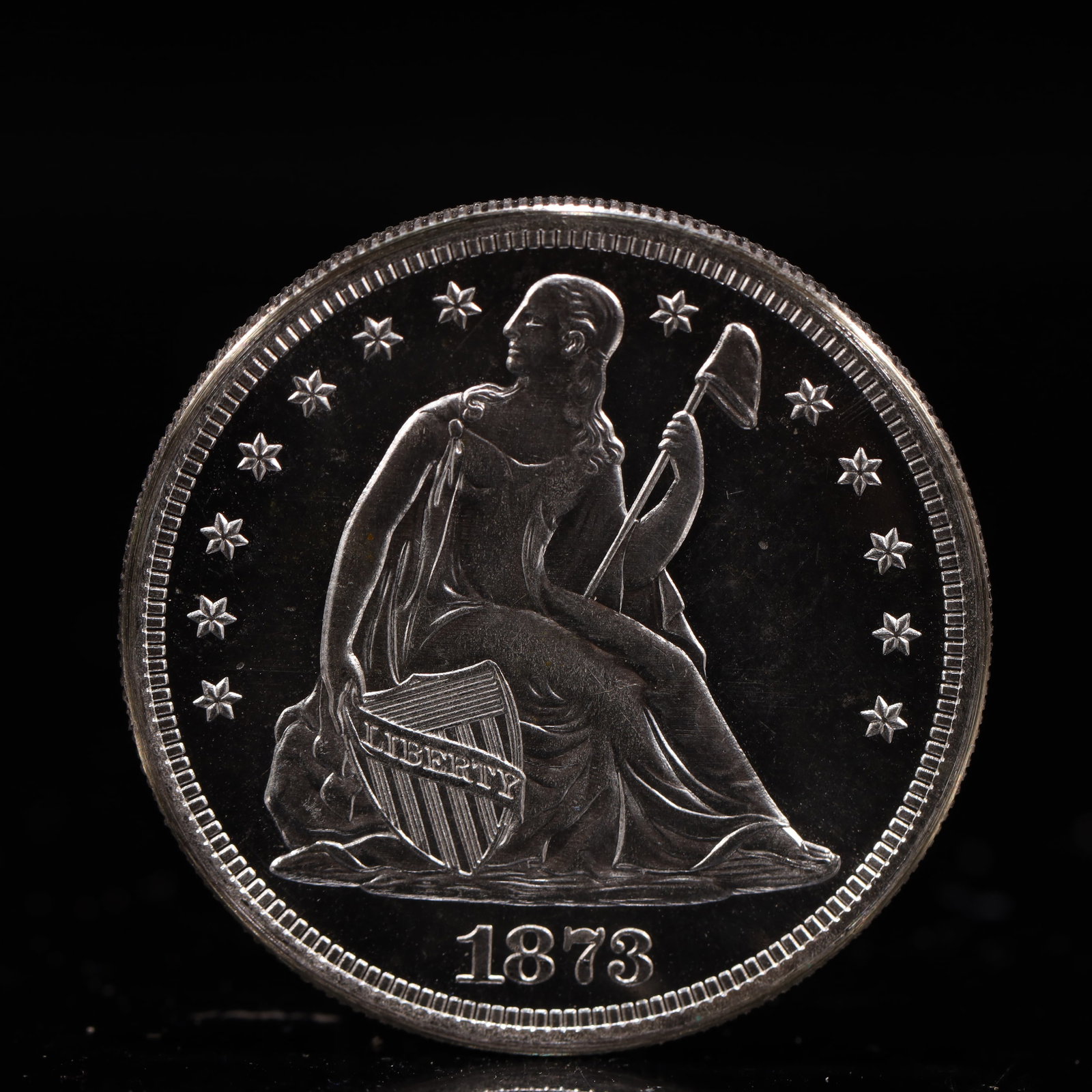 USA One Dollar 1873 Coin: American coin. IN GOD WE TRUST / LIBERTY / 1873 / UNITED STATES OF AMERICA / ONE DOL. Mint Mark: CC.Weight:26.9g.