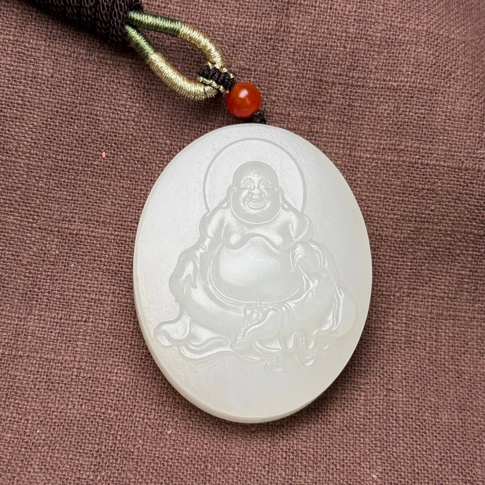 An Exquisite White Jade Statue of Maitreya Buddha Pattern Pendant: An Exquisite White Jade Statue of Maitreya Buddha Pattern Pendant,Qing Dynasty,China,Size:41mmx52mmx12mm,Weight:51g 白玉弥勒佛像纹挂件,中