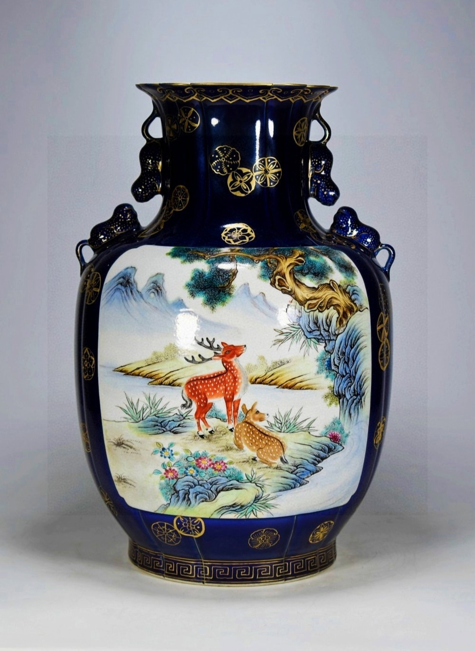 A Huge Ji Blue Glazed Famille-Rose Painted Gold Pine,Deer and Horse Pattern Beast-Ears Vase: A Huge Ji Blue Glazed Famille-Rose Painted Gold Pine,Deer and Horse Pattern Beast-Ears Vase,Qing Dynasty,China,Qianlong Four-character Mark,Size:15.7inx10.2in 霁蓝釉粉彩&