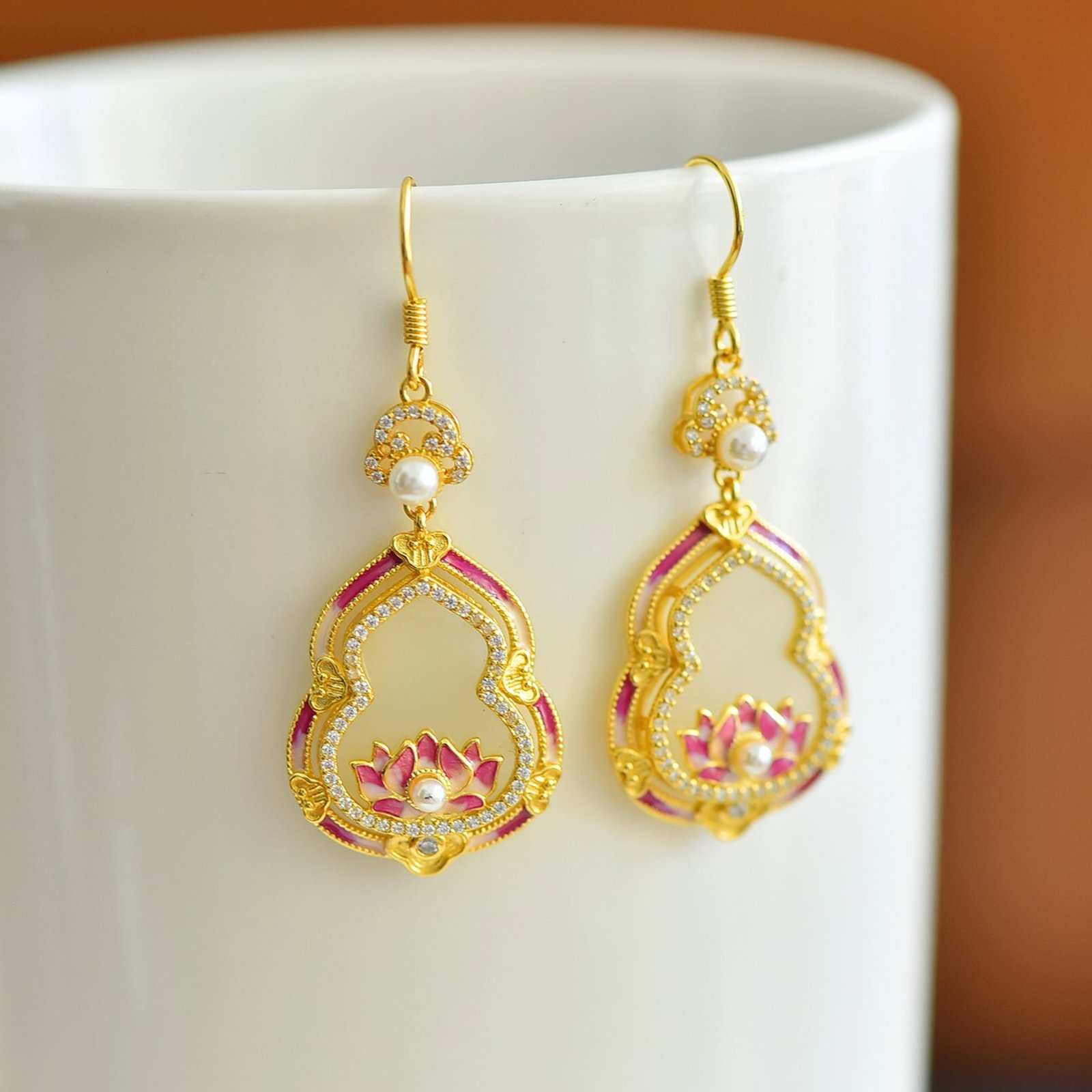 A Pair of Exquisite Sterling Silver-Gold Plated Inlaid White Jade Enamel Earrings,Inlaid Gems and: A Pair of Exquisite Sterling Silver-Gold Plated Inlaid White Jade Enamel Earrings,Inlaid Gems and Pearls Size:13mmx16mm 一对纯银镀金镶白玉珐