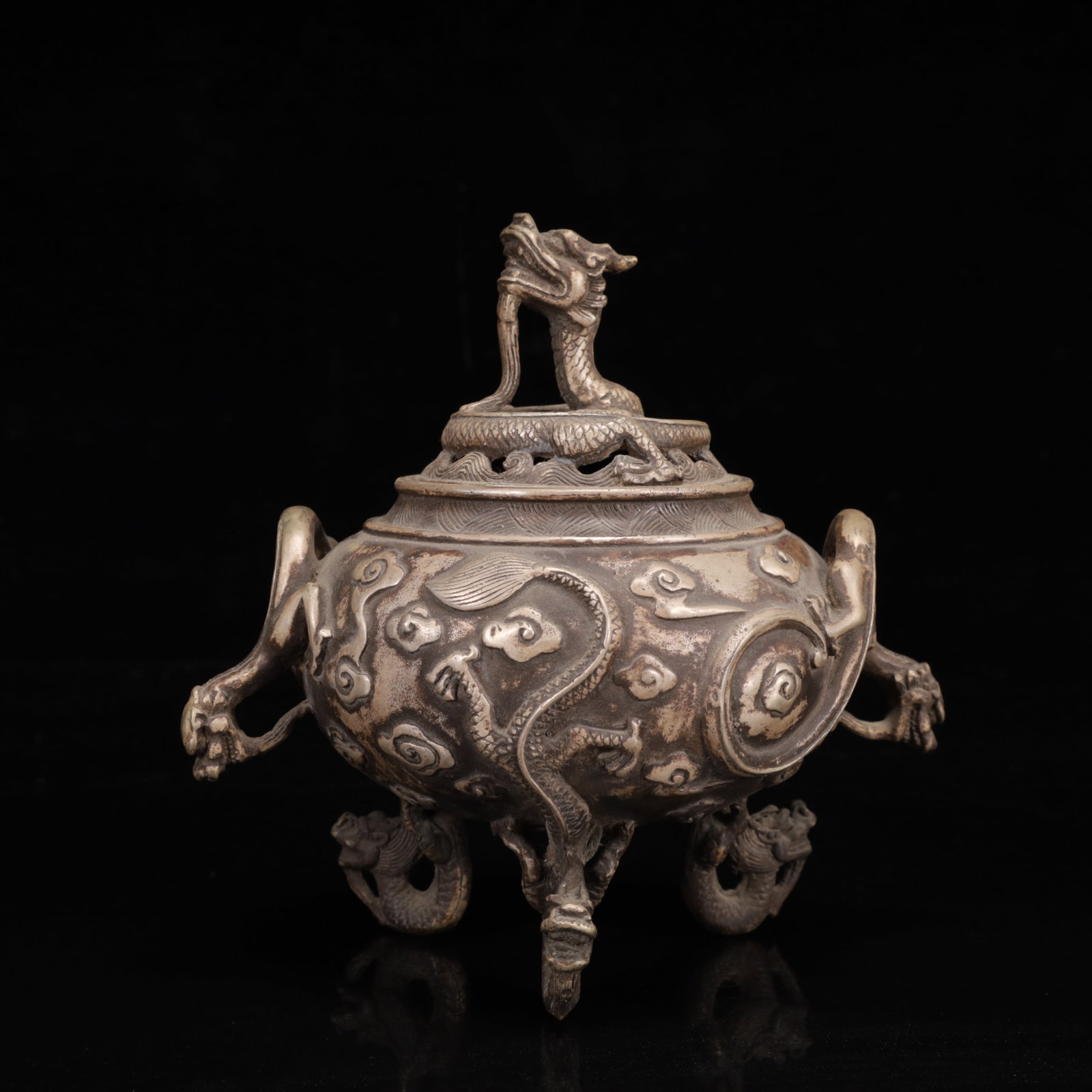 An Exquisite Silver-Plated Bronze Auspicious Cloud and Dragon Pattern Double-Ears and Tripod Censer: An Exquisite Silver-Plated Bronze Auspicious Cloud and Dragon Pattern Double-Ears and Tripod Censer,Ming Dynasty,China,Xuande Four-character Mark,Size:5.9inx4.3inx6.7in,Weight:850g 铜镀