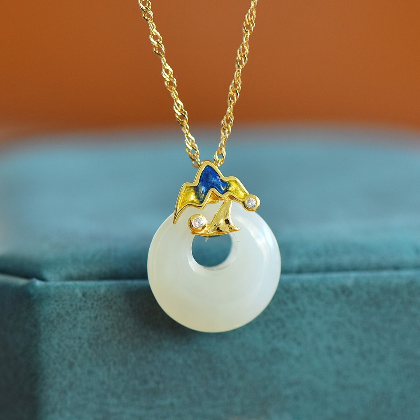 An Exquisite Sterling Silver-Gold Plated Inlaid White Jade Enamel Pendant: An Exquisite Sterling Silver-Gold Plated Inlaid White Jade Enamel Pendant,Size:15mmx15mm 纯银镀金镶白玉珐琅吊坠