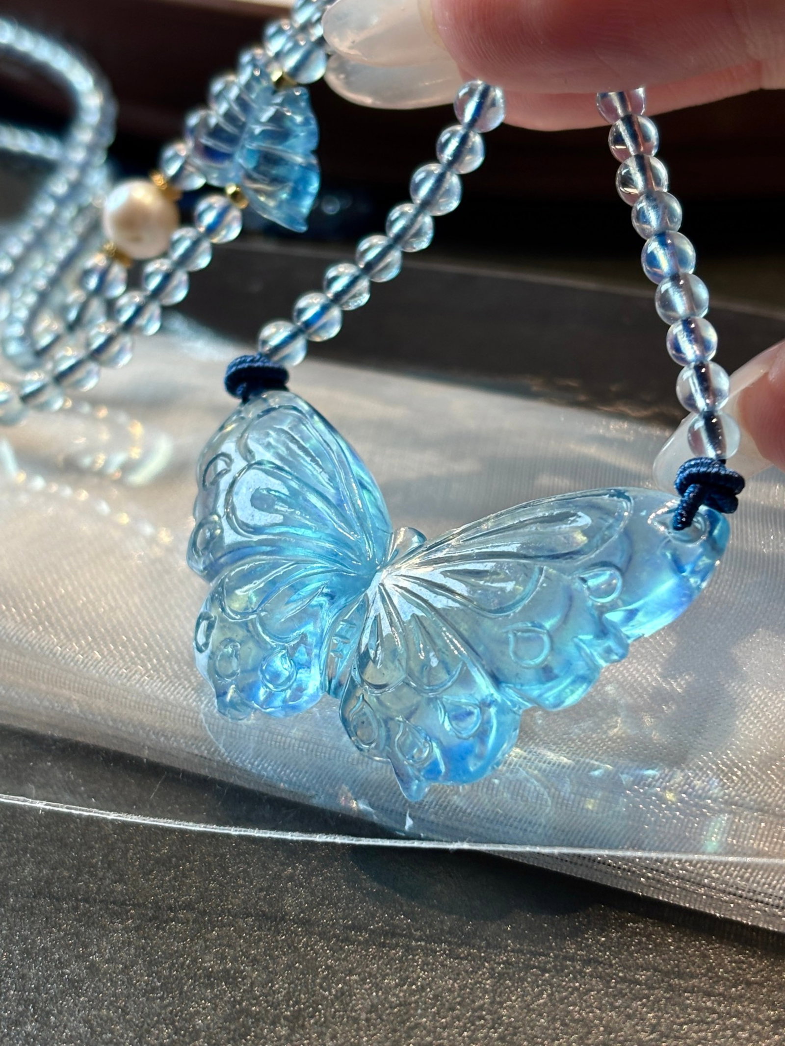 An Exquisite Aquamarine Butterfly Pendant: An Exquisite Aquamarine Butterfly Pendant,Size:49mmx26mm,Weight:22g 海蓝宝蝴蝶吊坠