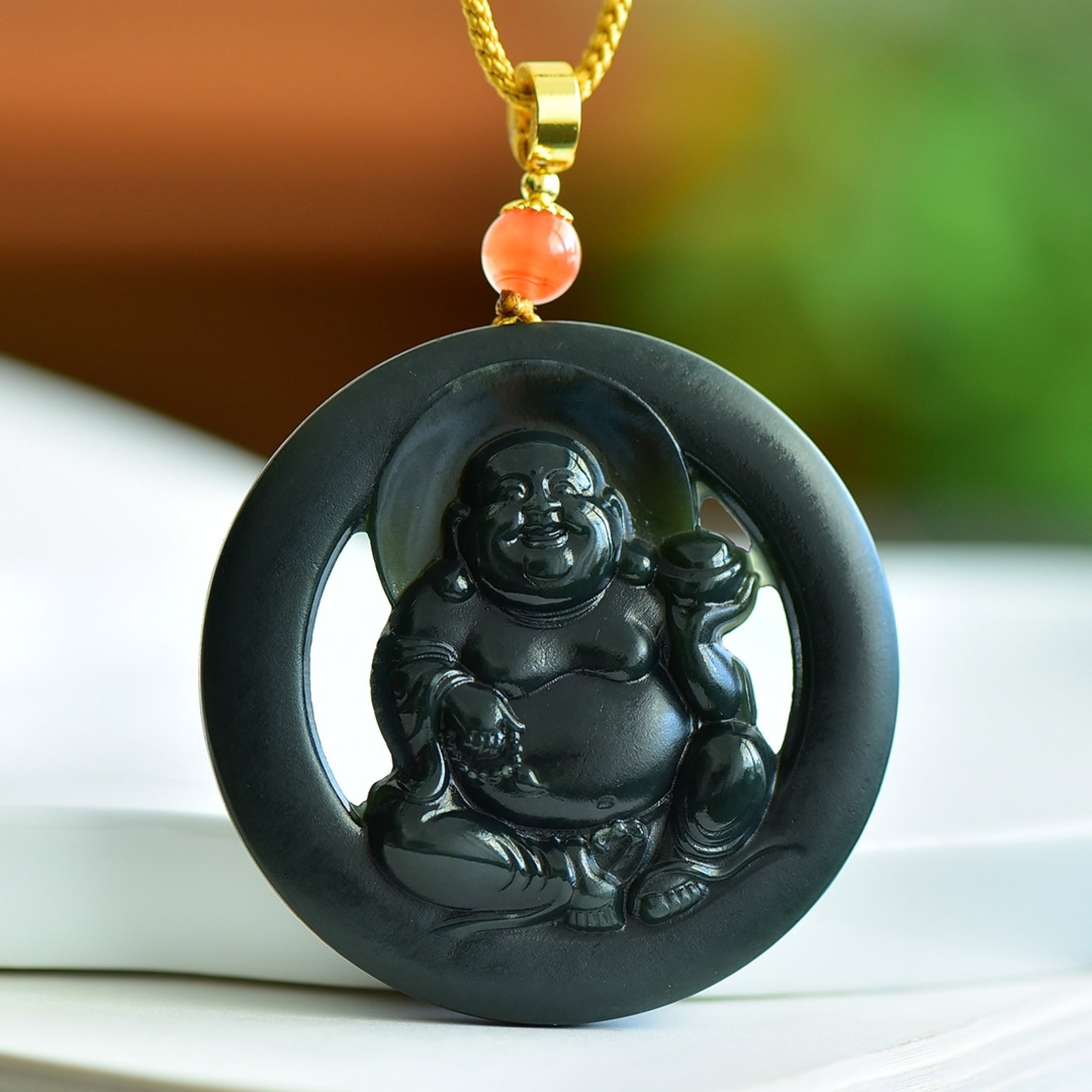 An Exquisite Sapphire Maitreya Buddha Pattern Pendant: An Exquisite Sapphire Maitreya Buddha Pattern Pendant,Size:55mmx10mm 寓意:弥勒佛象征着福气 心地善良、淡&