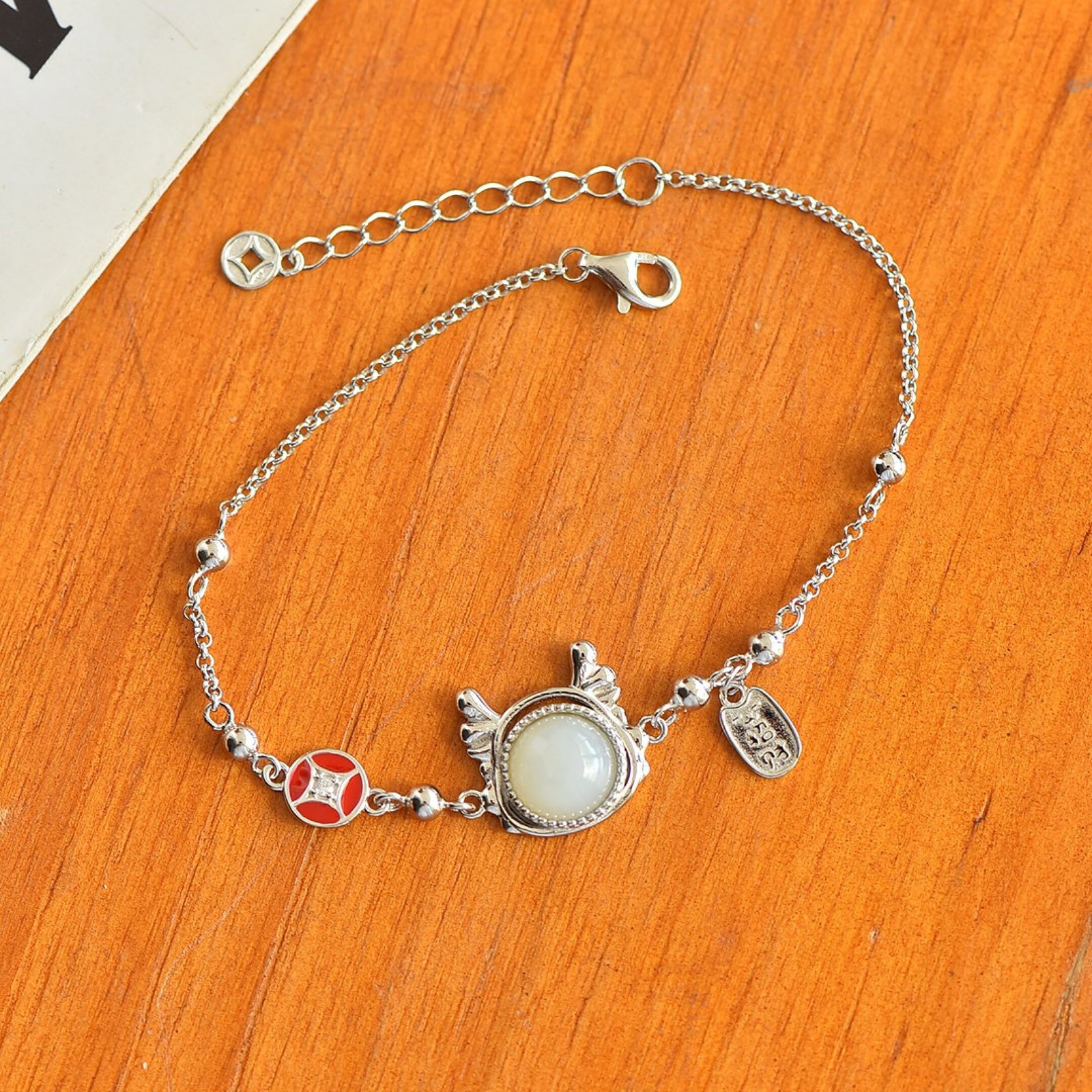An Exquisite Sterling Silver Inlaid White Jade Enamel Bracelet: An Exquisite Sterling Silver Inlaid White Jade Enamel Bracelet,Size:8mmx8mm 纯银镶白玉珐琅手链