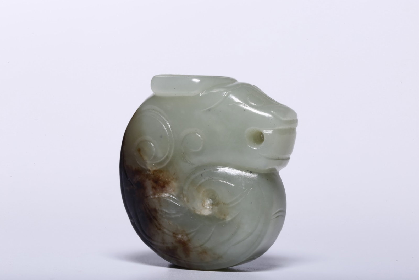 An Exquisite White Jade Pig-Dragon Hand Piece: An Exquisite White Jade Pig-Dragon Hand Piece,Qing Dynasty,China,Size:1.4inx1.4inx0.6in,Weight:39g 白玉猪龙手把件，中国清代
