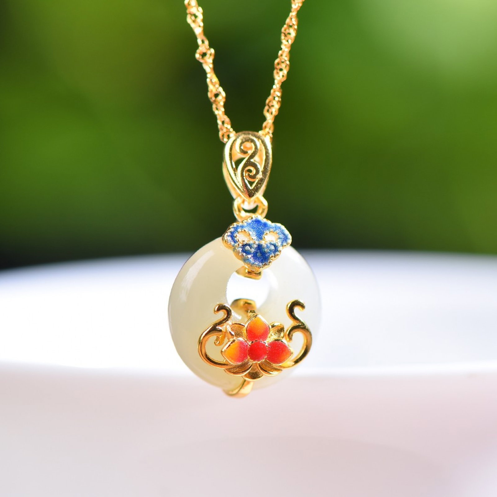 An Exquisite Sterling Silver-Gold Plated Inlaid White Jade Enamel Pendant: An Exquisite Sterling Silver-Gold Plated Inlaid White Jade Enamel Pendant,Size:14mmx18mm 纯银镀金镶白玉珐琅吊坠