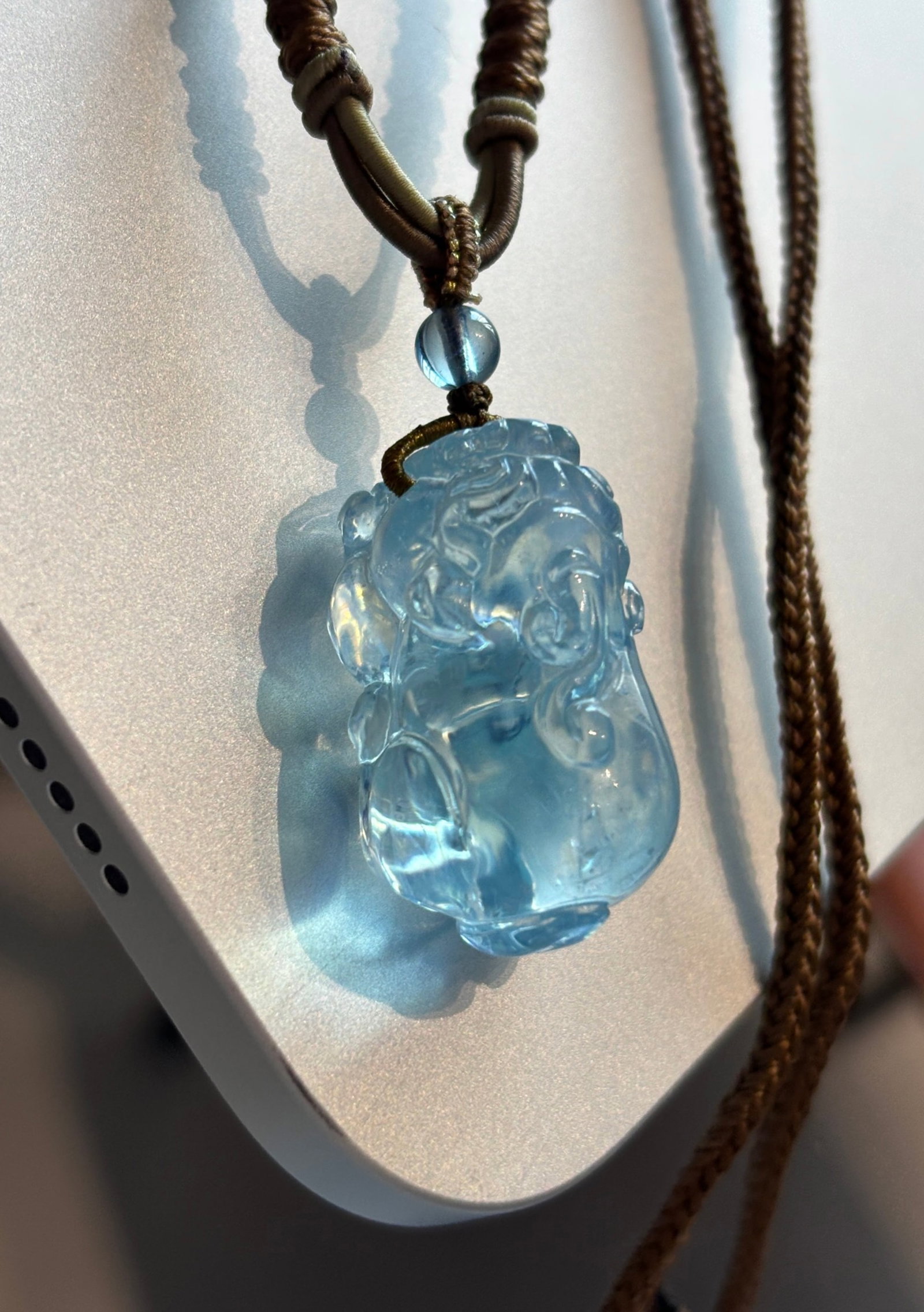 An Exquisite Aquamarine Auspicious Beast Pendant: An Exquisite Aquamarine Auspicious Beast Pendant,Size:29mmx17mm,Total Weight:15g 海蓝宝瑞兽吊坠