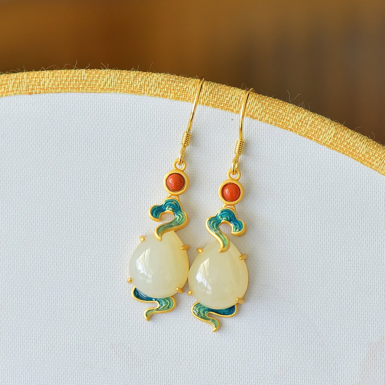 A Pair of Exquisite Sterling Silver-Gold Plated Inlaid White Jade Earrings: A Pair of Exquisite Sterling Silver-Gold Plated Inlaid White Jade Earrings,Size:10mmx12mm 一对纯银镀金镶白玉耳环