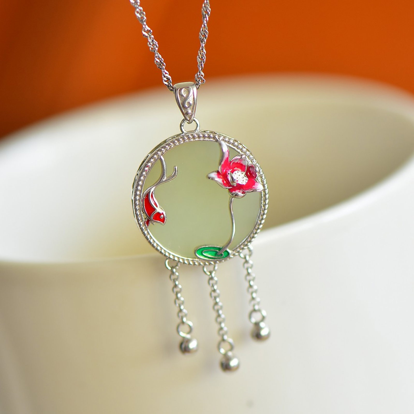 An Exquisite Sterling Silver Inlaid White Jade Pendant: Sterling Silver Inlaid White Jade Pendant , Size :18mmx18mm 纯银镶白玉吊坠,尺寸:18mmx18mm