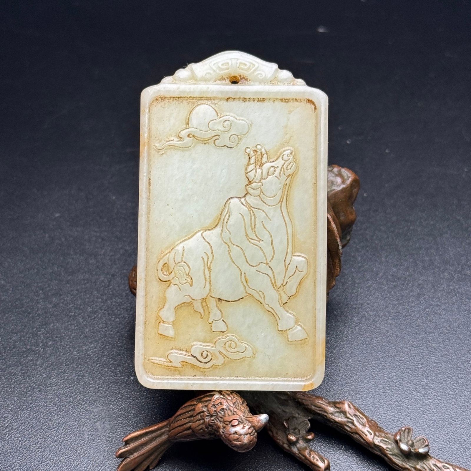 An Exquisite White Jade Buffalo Pattern Pendant: An Exquisite White Jade Buffalo Pattern Pendant,Qing Dynasty,China,Size:69mmx38mmx9mm,Weight:52g 白玉牛纹挂件,中国清代