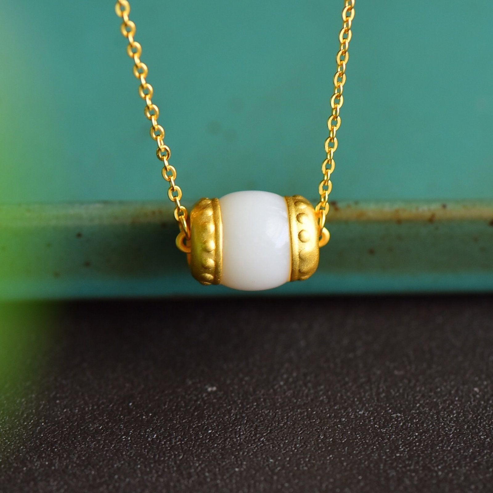 An Exquisite Sterling Silver-Gold Plated Inlaid White Jade Pendant: An Exquisite Sterling Silver-Gold Plated Inlaid White Jade Pendant 纯银镀金镶白玉吊坠