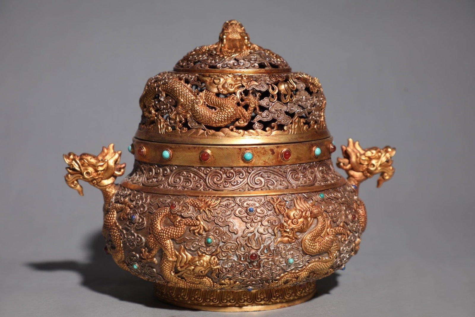 An Exquisite Gilt Silver Auspicious Cloud and Dragon Pattern Dragon-Ears Censer,Inlaid Turquoise and: An Exquisite Gilt Silver Auspicious Cloud and Dragon Pattern Dragon-Ears Censer,Inlaid Turquoise and Gems,Qing Dynasty,China,Size:7.1inx5.1inx6.7inx8.7in,Weight:2150g 银鎏金祥&