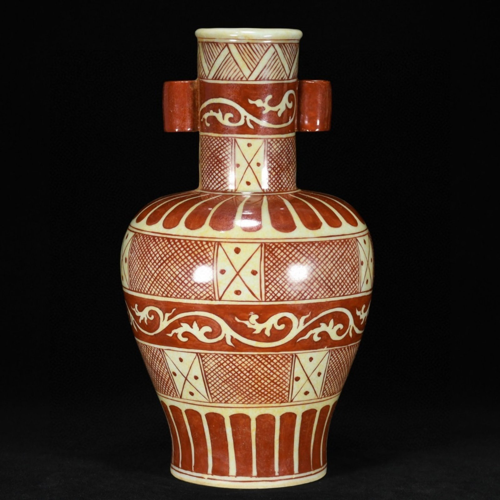 A Rare Red Glazed Scroll Grass Pattern Double-Ears Vase: A Rare Red Glazed Scroll Grass Pattern Double-Ears Vase,Ming Dynasty,China,Zhengde Six-character Mark,Size:13inx7.5in 红釉卷草纹双耳瓶,中国&
