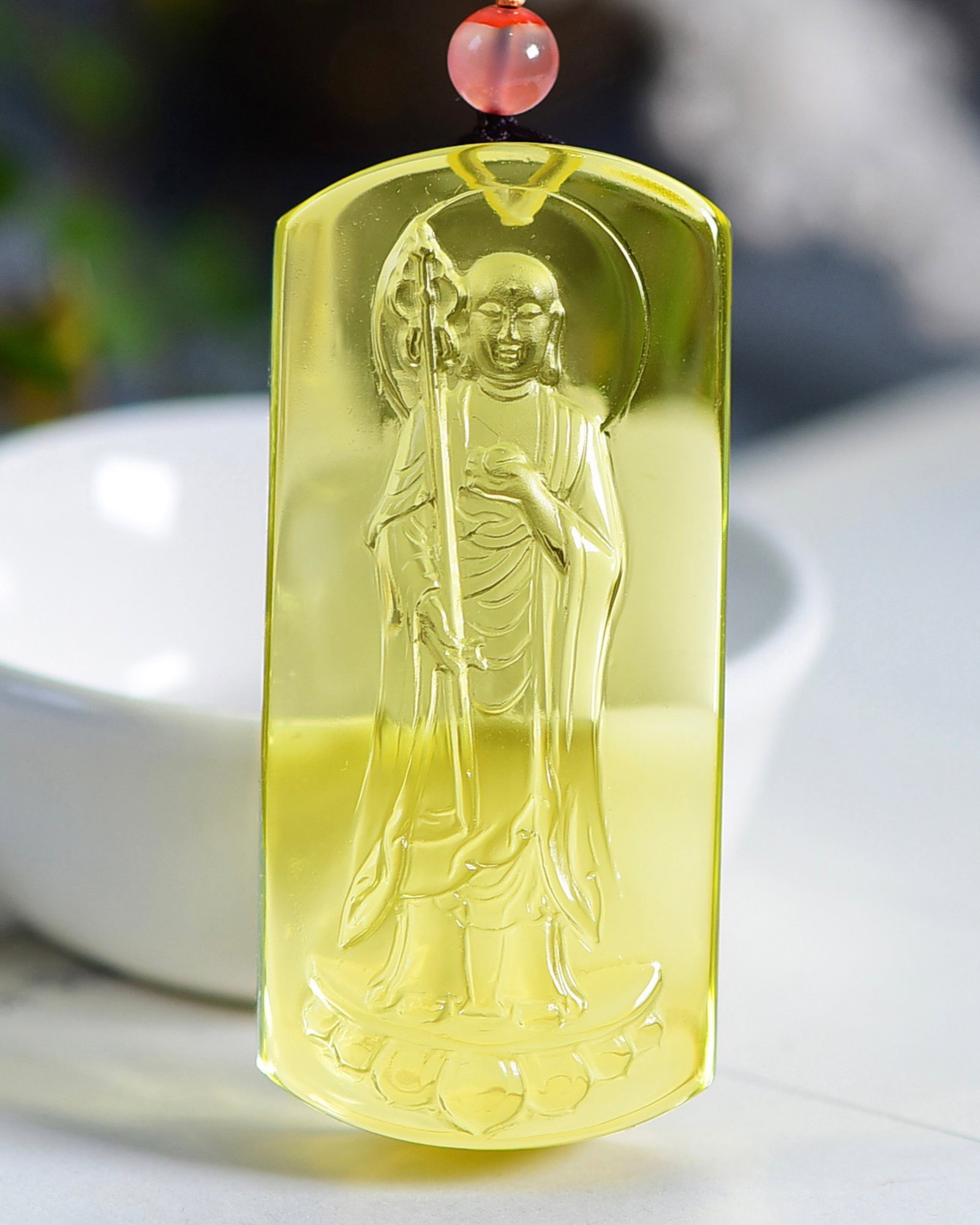 An Exquisite Crystal Statue of Kshitigarbha Bodhisattva Pattern Pendant: An Exquisite Crystal Statue of Kshitigarbha Bodhisattva Pattern Pendant,Size:61.3mmx28.5mmx17mm 水晶地藏王像纹吊坠