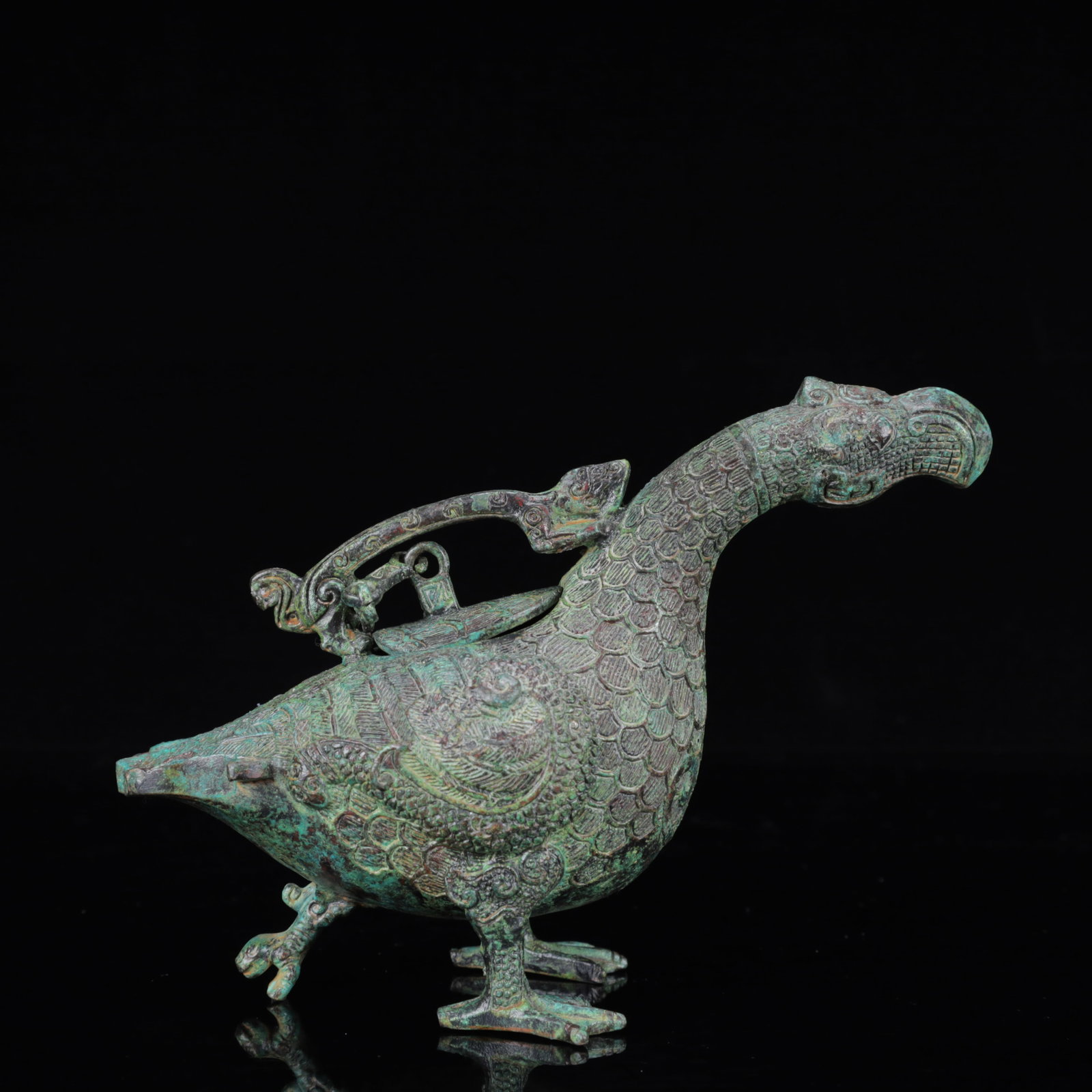 An Archaic Bronze Peacock Censer: An Archaic Bronze Peacock Censer,the Warring States Period in China,Size:7.5inx2.8inx5.1in,Weight:700g 青铜孔雀香炉,中国战国时期