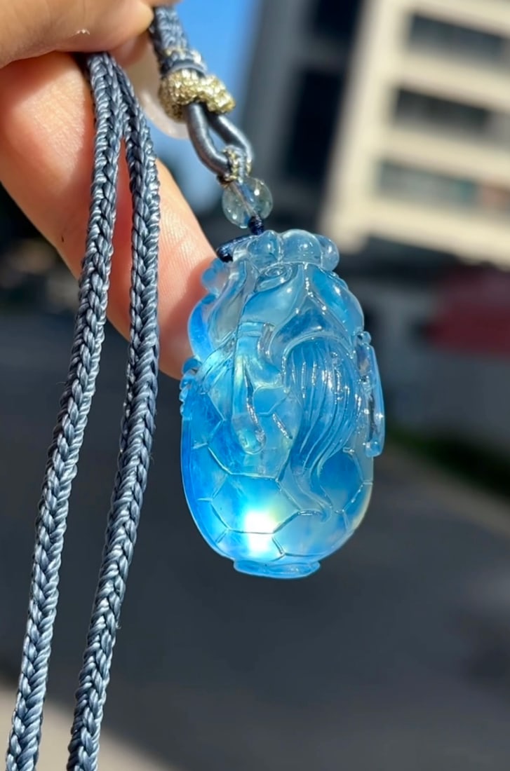 An Exquisite Aquamarine Auspicious Beast Pendant: An Exquisite Aquamarine Auspicious Beast Pendant,Size:39mmx23mmx18.2mm,Weight:27g 海蓝宝瑞兽吊坠