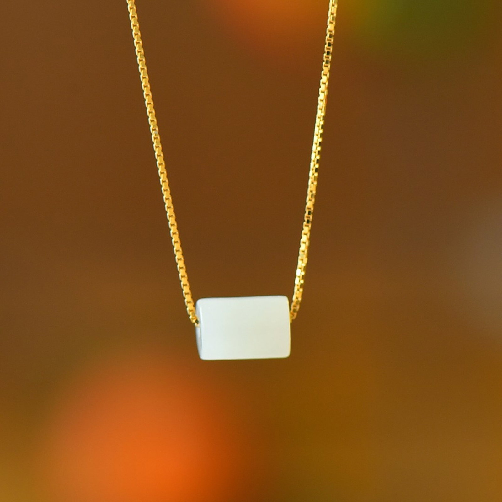 An Exquisite Sterling Silver-Gold Plated Inlaid White Jade Pendant: An Exquisite Sterling Silver-Gold Plated Inlaid White Jade Pendant,Size:6mmx8mm 纯银镀金镶白玉吊坠