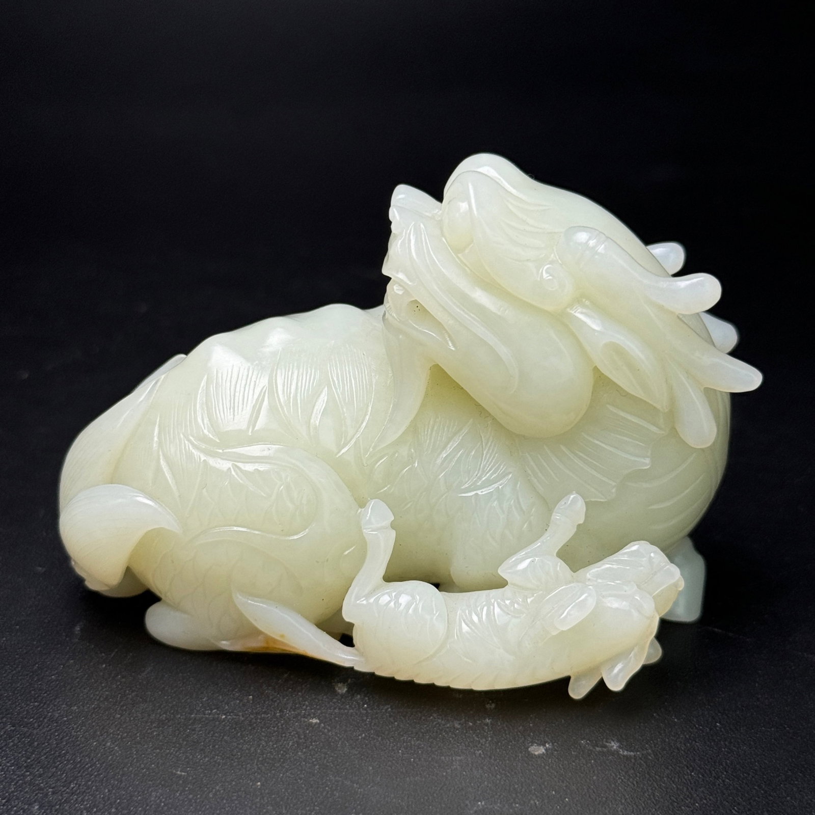 An Exquisite White Jade Kylin Hand Piece (1 of 7)