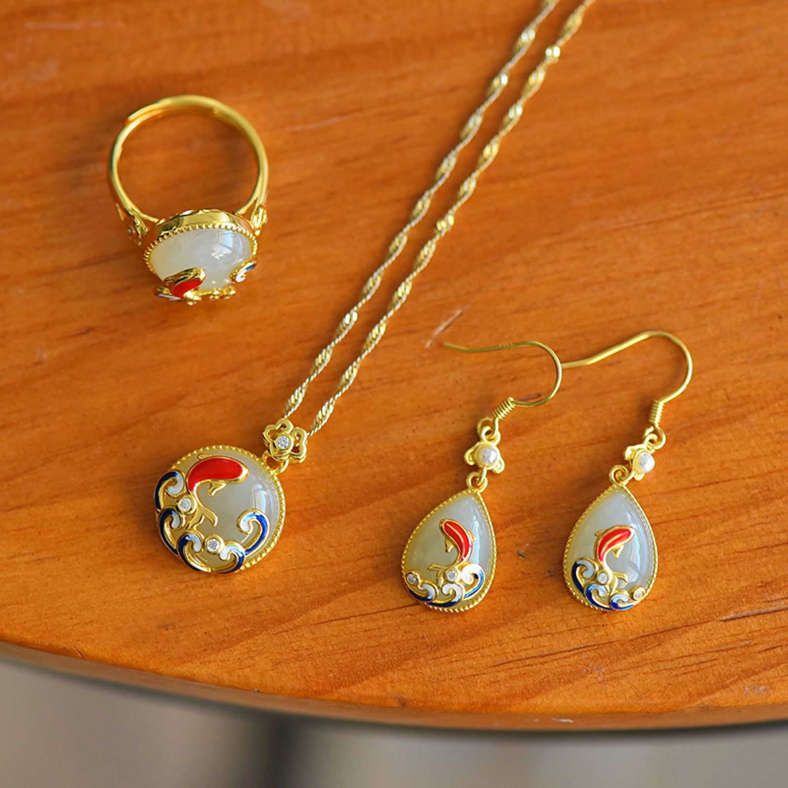 A Set of Fine Sterling Silver-Gold Plated Inlaid White Jade Jewelrys: A Set of Fine Sterling Silver-Gold Plated Inlaid White Jade Jewelrys,Size:14mmx14mm,12mmx12mm,10mmx14mm 一套纯银镀金镶白玉首饰