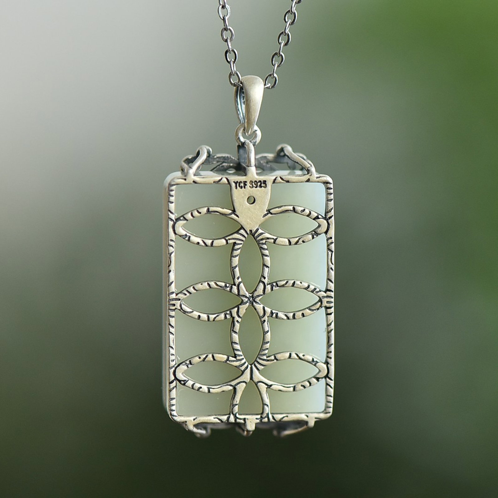 An Exquisite Sterling Silver Inlaid White Jade Pendant: An Exquisite Sterling Silver Inlaid White Jade Pendant,Size:20mmx30mm 纯银镶白玉吊坠