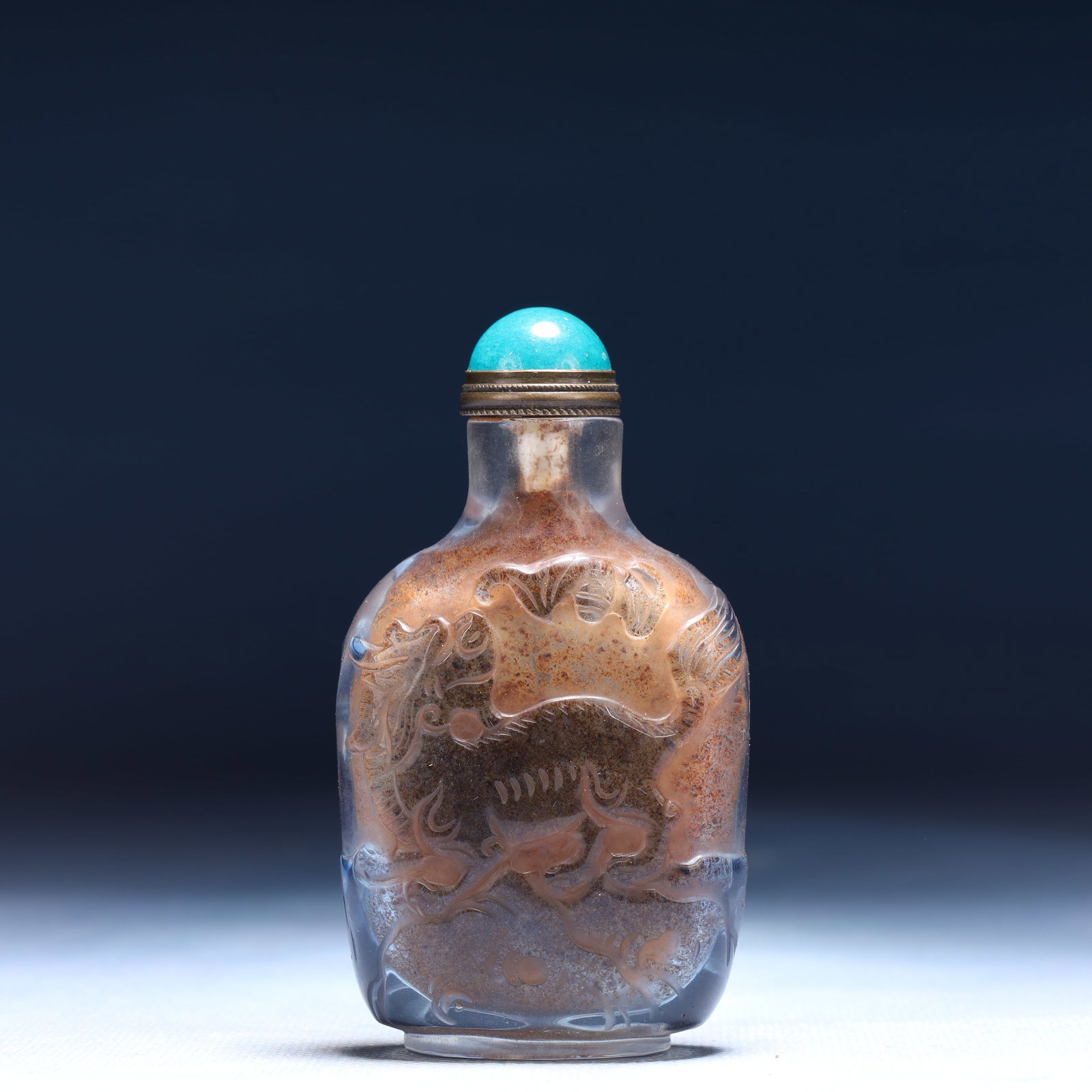 An Exquisite Glass Auspicious Beast Pattern Snuff Bottle: An Exquisite Glass Auspicious Beast Pattern Snuff Bottle,Qing Dynasty,China,Qianlong Four-character Mark,Size:1.8inx0.8inx3.1in,Weight:83g 琉璃瑞兽纹鼻烟ã