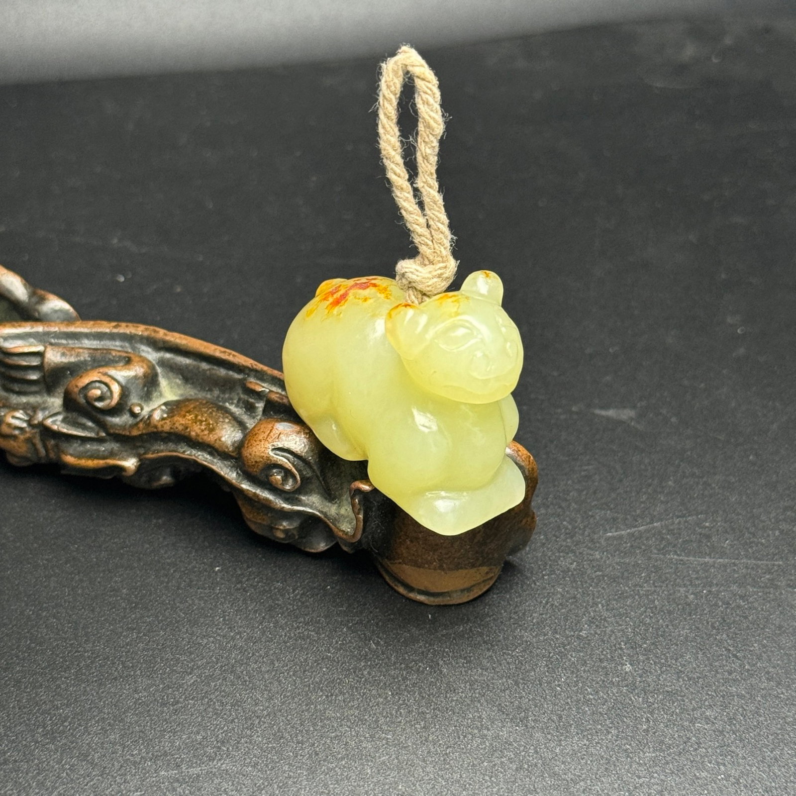 An Exquisite Yellow Jade Auspicious Beast Pendant: An Exquisite Yellow Jade Auspicious Beast Pendant,Qing Dynasty,China,Size:39mmx28mmx20mm,Weight:34g 黄玉瑞兽挂件,中国清代