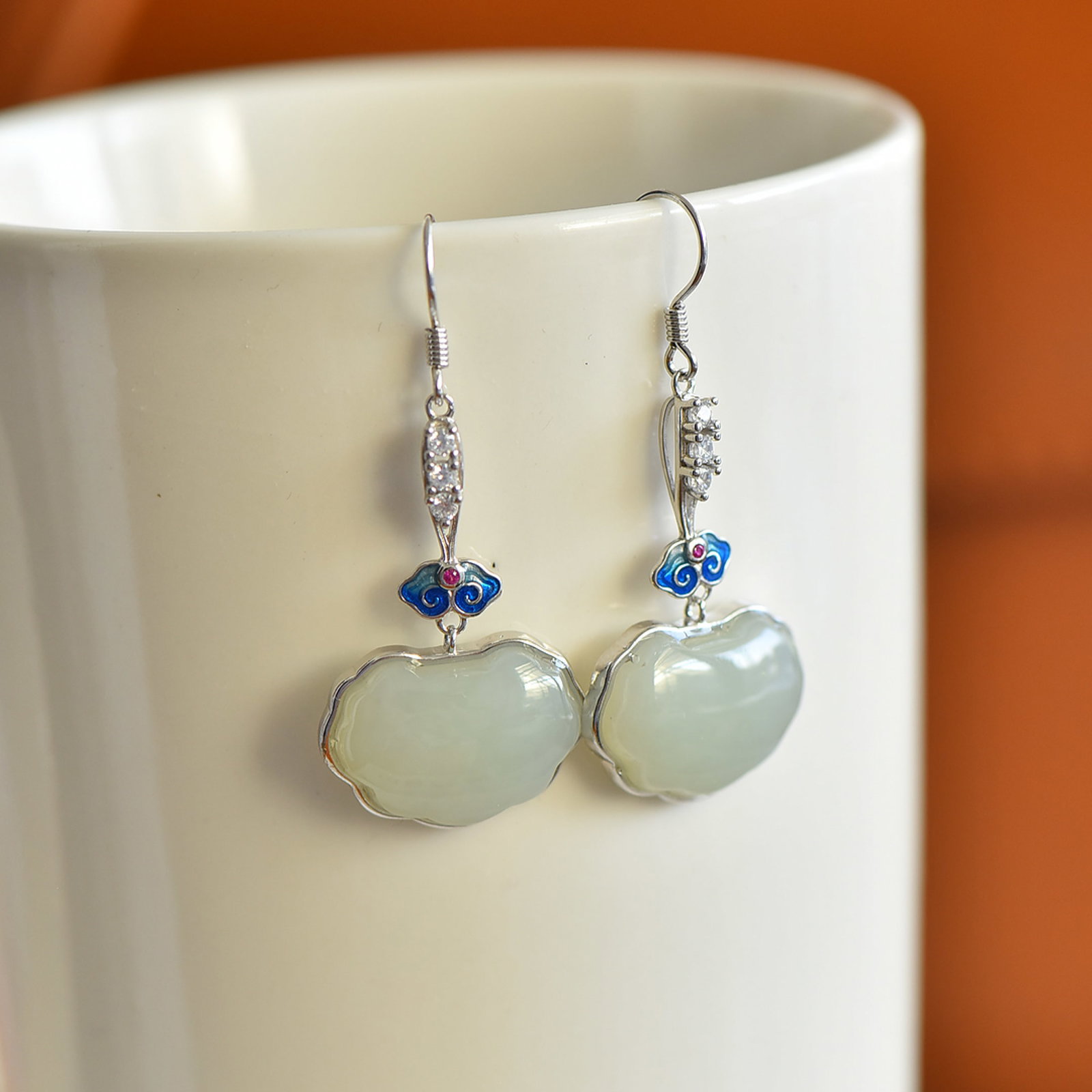 A Pair of Exquisite Sterling Silver Inlaid White Jade Earrings,Inlaid Diamonds: A Pair of Exquisite Sterling Silver Inlaid White Jade Earrings,Inlaid Diamonds,Size:13mmx18mm 一对纯银镶白玉耳环,嵌钻石