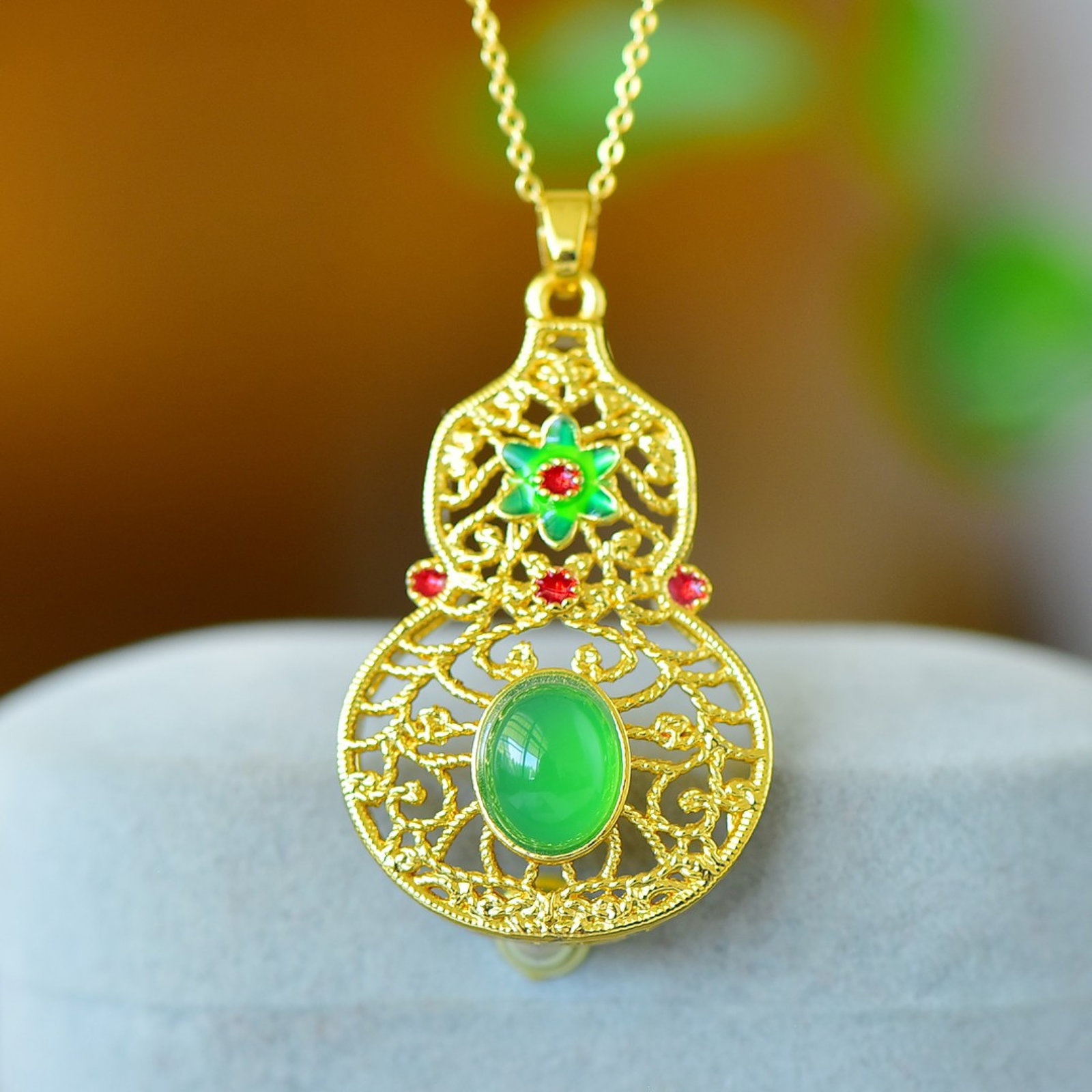 An Exquisite Enamel Gourd Pendant: An Exquisite Enamel Gourd Pendant,Size:8mmx10mm 珐琅葫芦吊坠