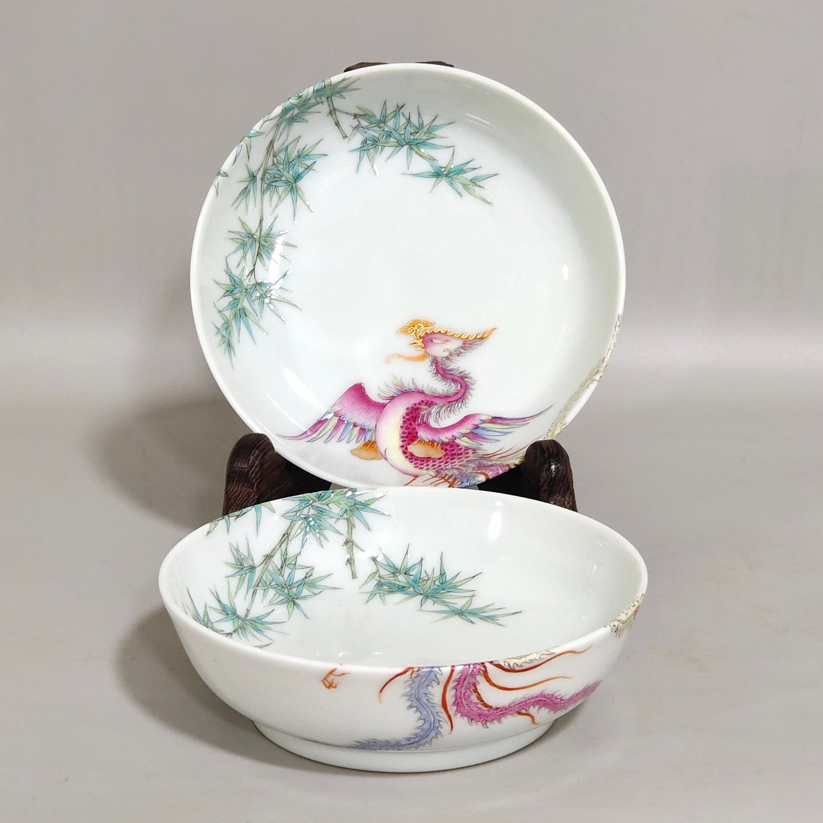 A Pair of Exquisite Famille-Rose Bamboo and Phoenix Pattern Plates: A Pair of Exquisite Famille-Rose Bamboo and Phoenix Pattern Plates,Qing Dynasty,China,Yongzheng Six-character Mark,Size:1.1inx4.2in 一对粉彩竹凤纹盘,