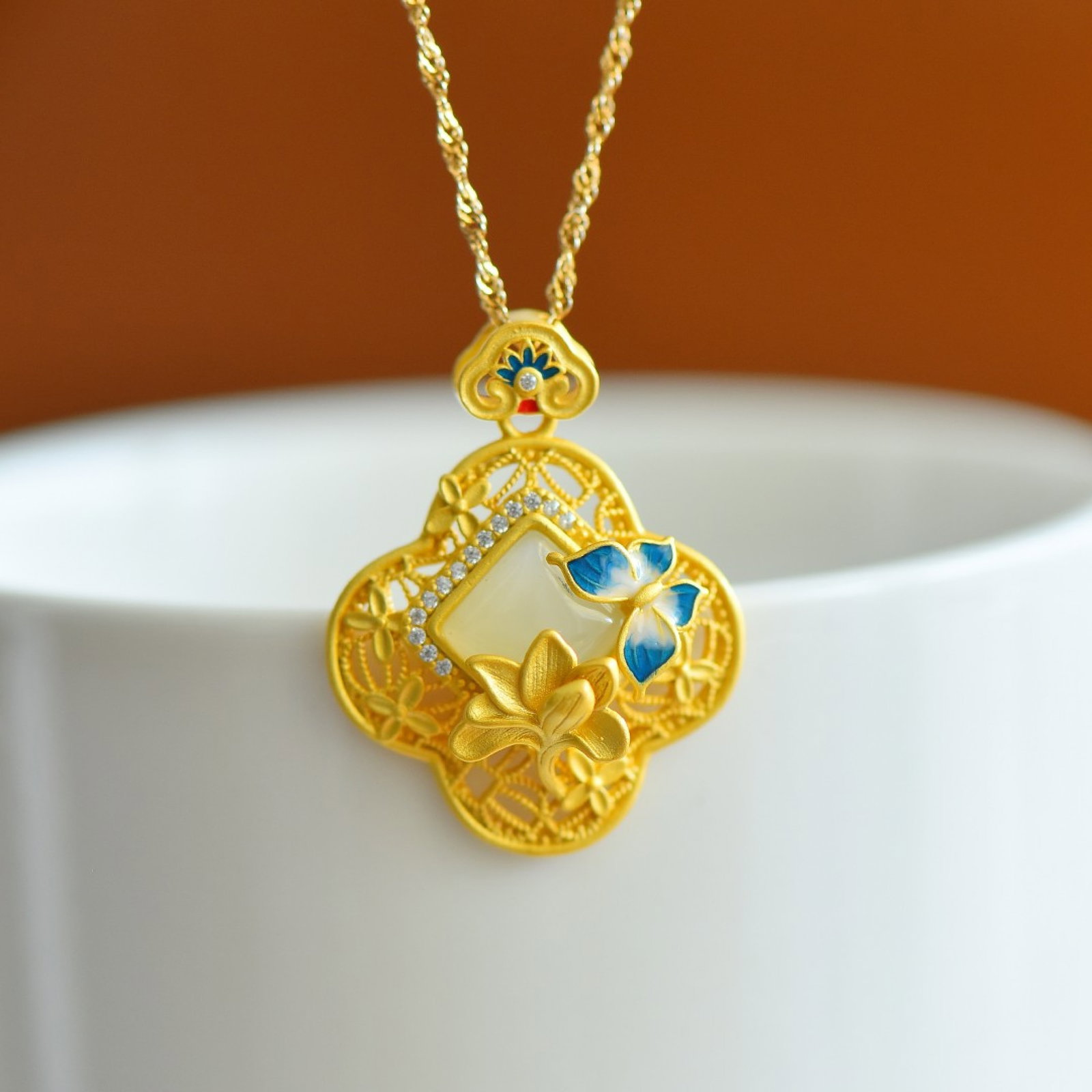 An Exquisite Sterling Silver-Gold Plated Inlaid White Jade Enamel Pendant: An Exquisite Sterling Silver-Gold Plated Inlaid White Jade Enamel Pendant,Size:8mmx8mm 纯银镀金镶白玉珐琅吊坠