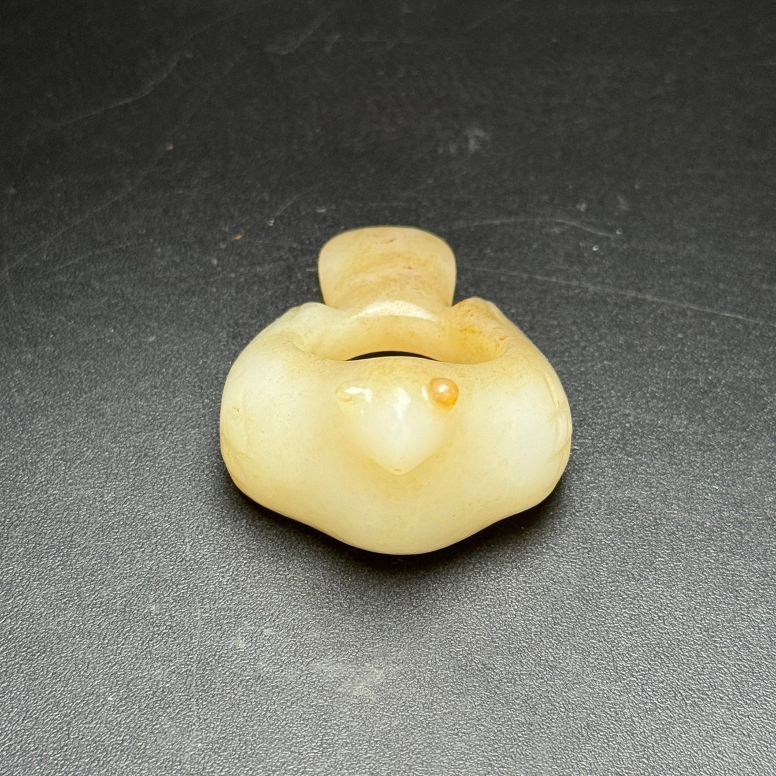 An Exquisite White Jade Bird-Shaped Fingerstall: An Exquisite White Jade Bird-Shaped Fingerstall,Qing Dynasty,China,Size:64mmx43mmx29mm,Weight:50g 白玉鸟形扳指,中国清代