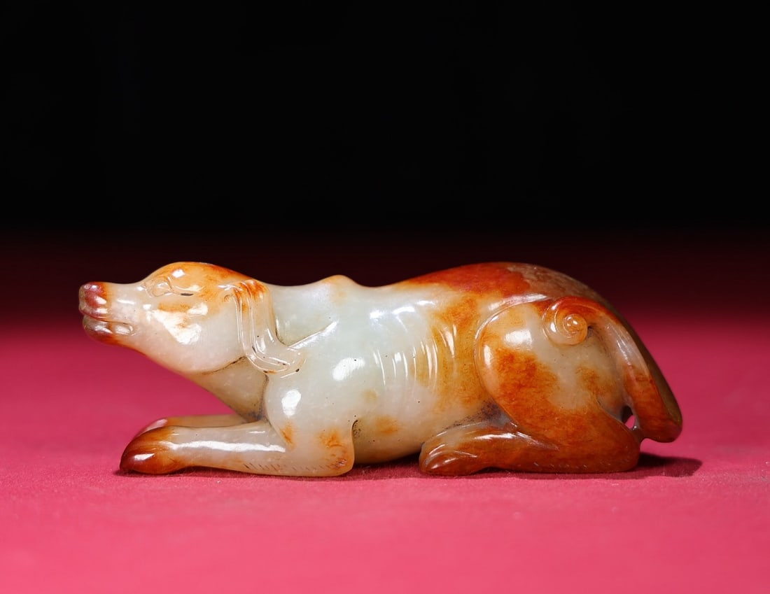 An Exquisite White Jade Dog Hand Piece: An Exquisite White Jade Dog Hand Piece,Qing Dynasty,China,Size:112mmx35mmx36mm,Weight:207g 白玉狗手把件,中国清代