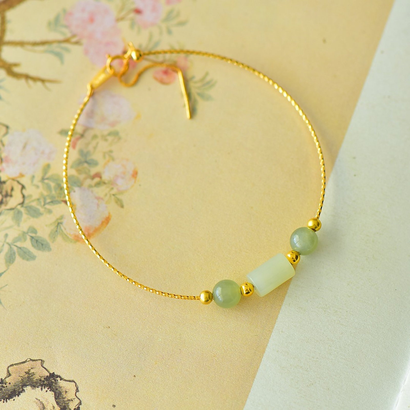 An Exquisite Sterling Silver-Gold Plated Inlaid White Jade Bracelet: An Exquisite Sterling Silver-Gold Plated Inlaid White Jade Bracelet,Size:6mmx6mm 纯银镀金镶白玉手链