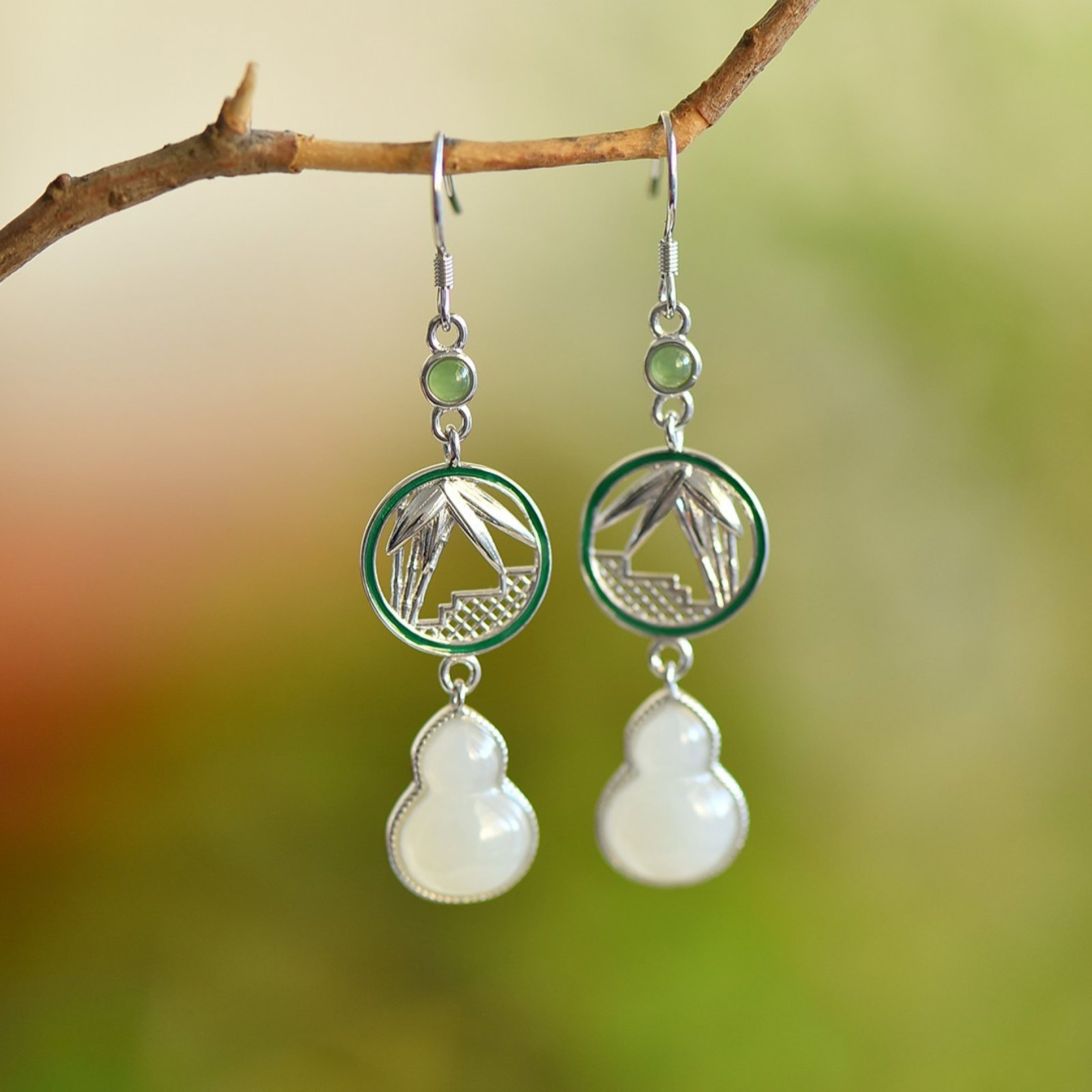 A Pair of Exquisite Sterling Silver Inlaid White Jade Gourd Earrings: A Pair of Exquisite Sterling Silver Inlaid White Jade Gourd Earrings 一对纯银镶白玉葫芦耳环