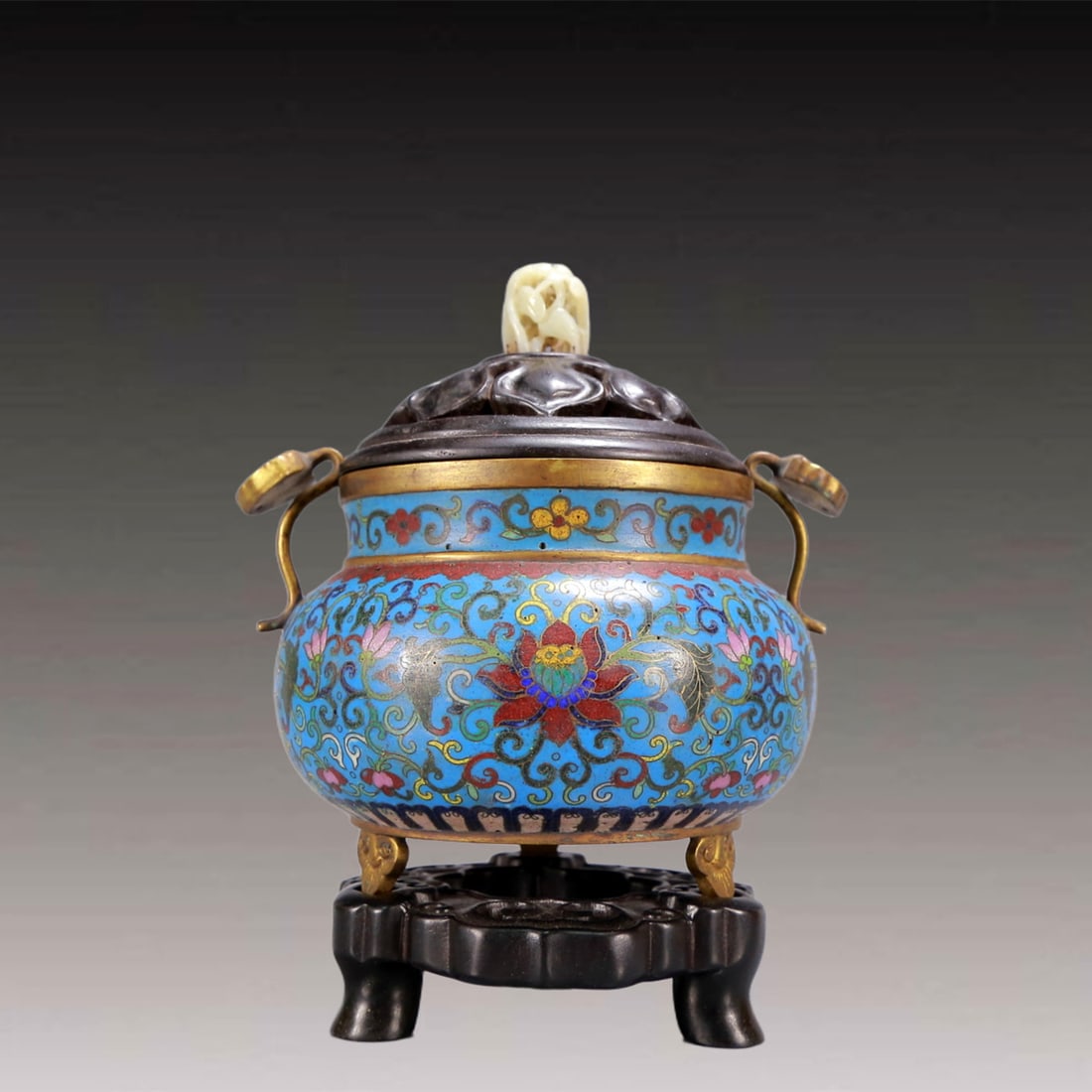 An Archaic Cloisonne Lotus Pattern Ruyi-Ears and Tripod Censer,with Zitanwood Inlaid White Jade: An Archaic Cloisonne Lotus Pattern Ruyi-Ears and Tripod Censer,with Zitanwood Inlaid White Jade Cover,Qing Dynasty, China,Qianlong Four-character Mark,Size:6.1inx5.1inx7.1in,Weight:1000g 景Ė