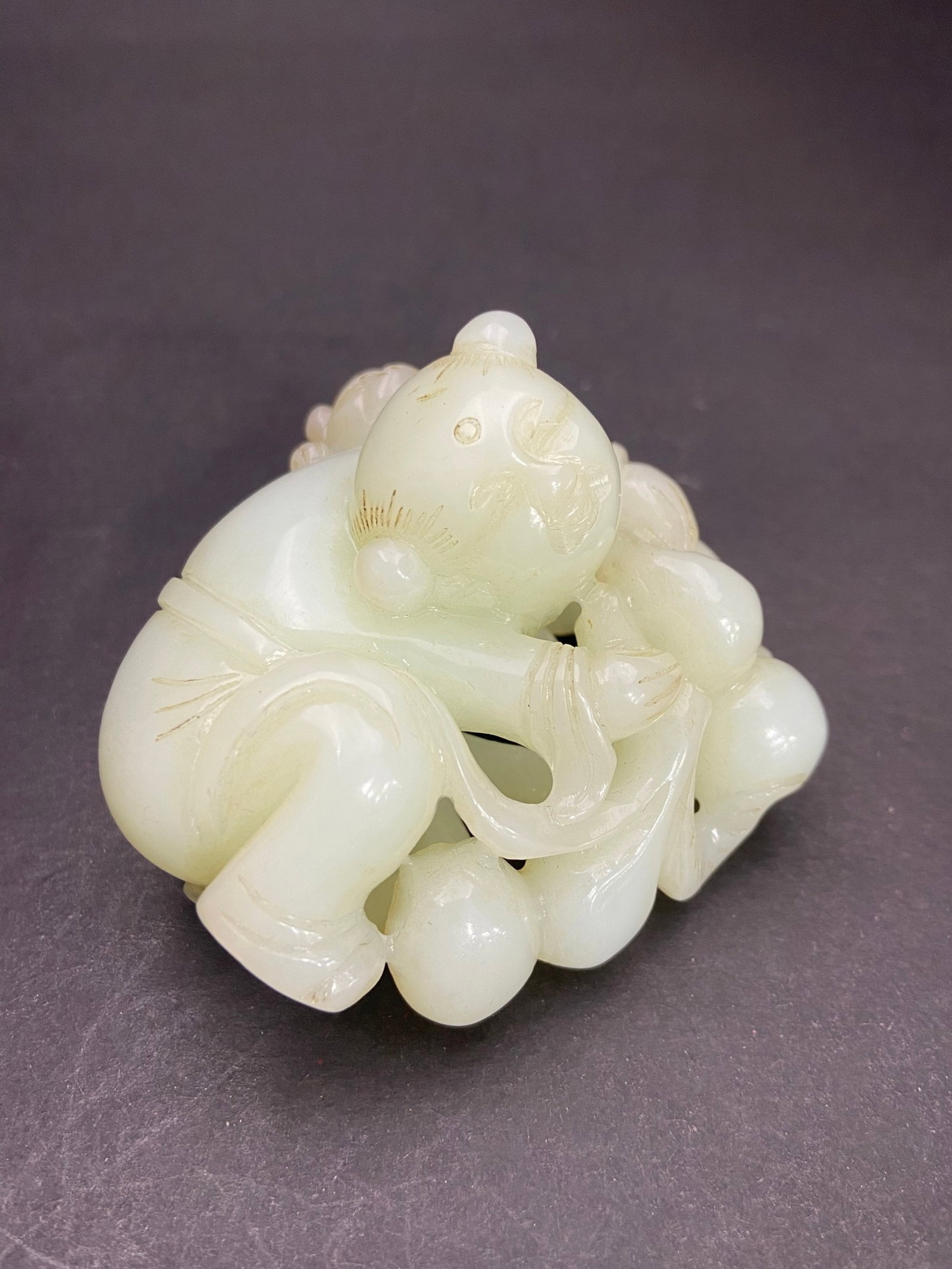 An Exquisite White Jade Figure Hand Piece: An Exquisite White Jade Figure Hand Piece,Qing Dynasty,China,Size:68mmx65mmx50mm,Weight:149g 白玉人物手把件,中国清代