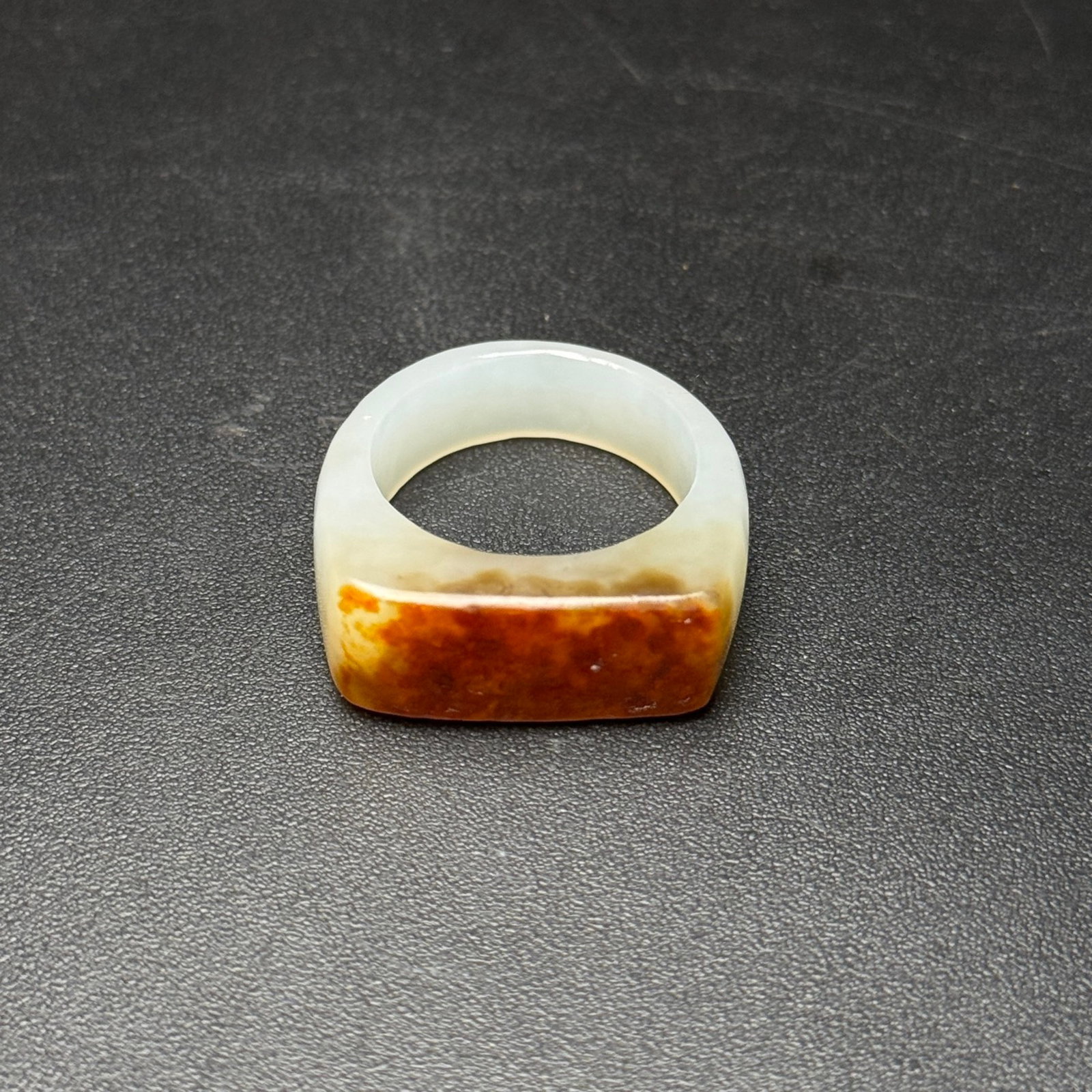 An Exquisite White Jade Fingerstall: An Exquisite White Jade Fingerstall,Qing Dynasty,China,Size:28mmx27mmx10mm,Weight:8g 白玉扳指,中国清代