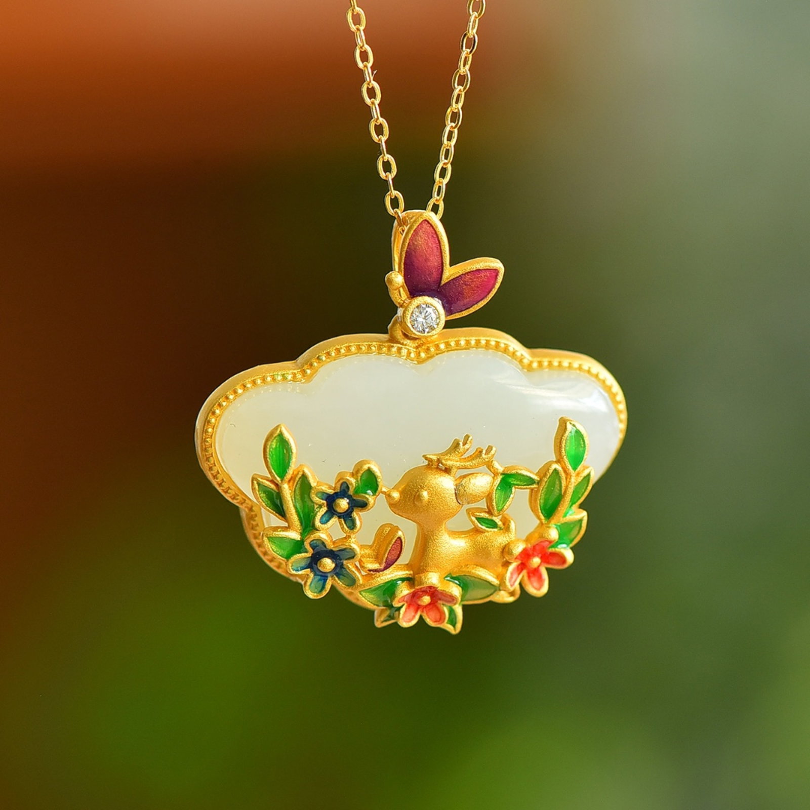 An Exquisite Sterling Silver-Gold Plated Inlaid White Jade Enamel Pendant: Sterling Silver-Gold Plated Inlaid White Jade Enamel Pendant , Size :17mmx26mm 纯银镀金镶白玉珐琅吊坠,尺寸:17mmx26mm